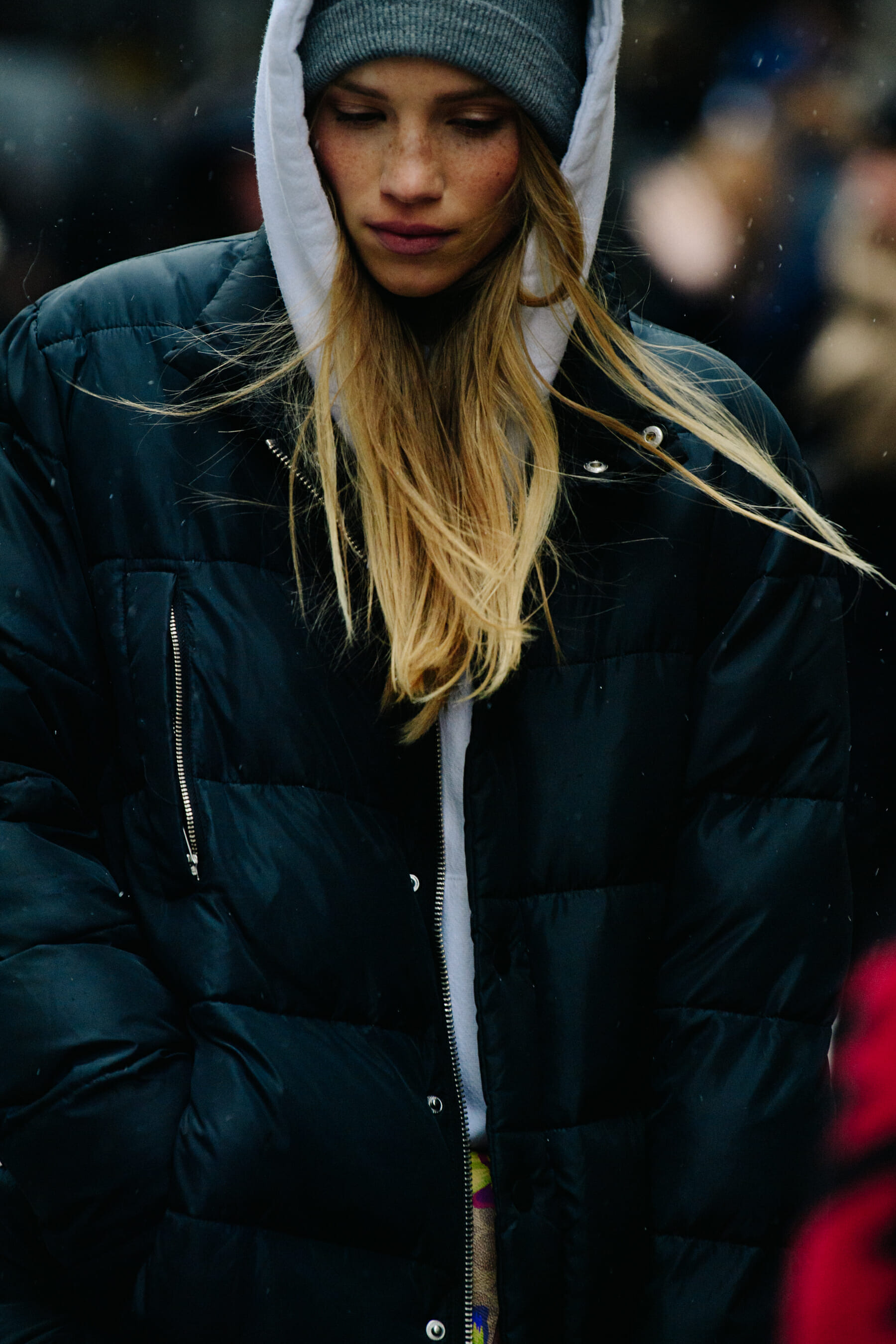Model wearing white hoodie