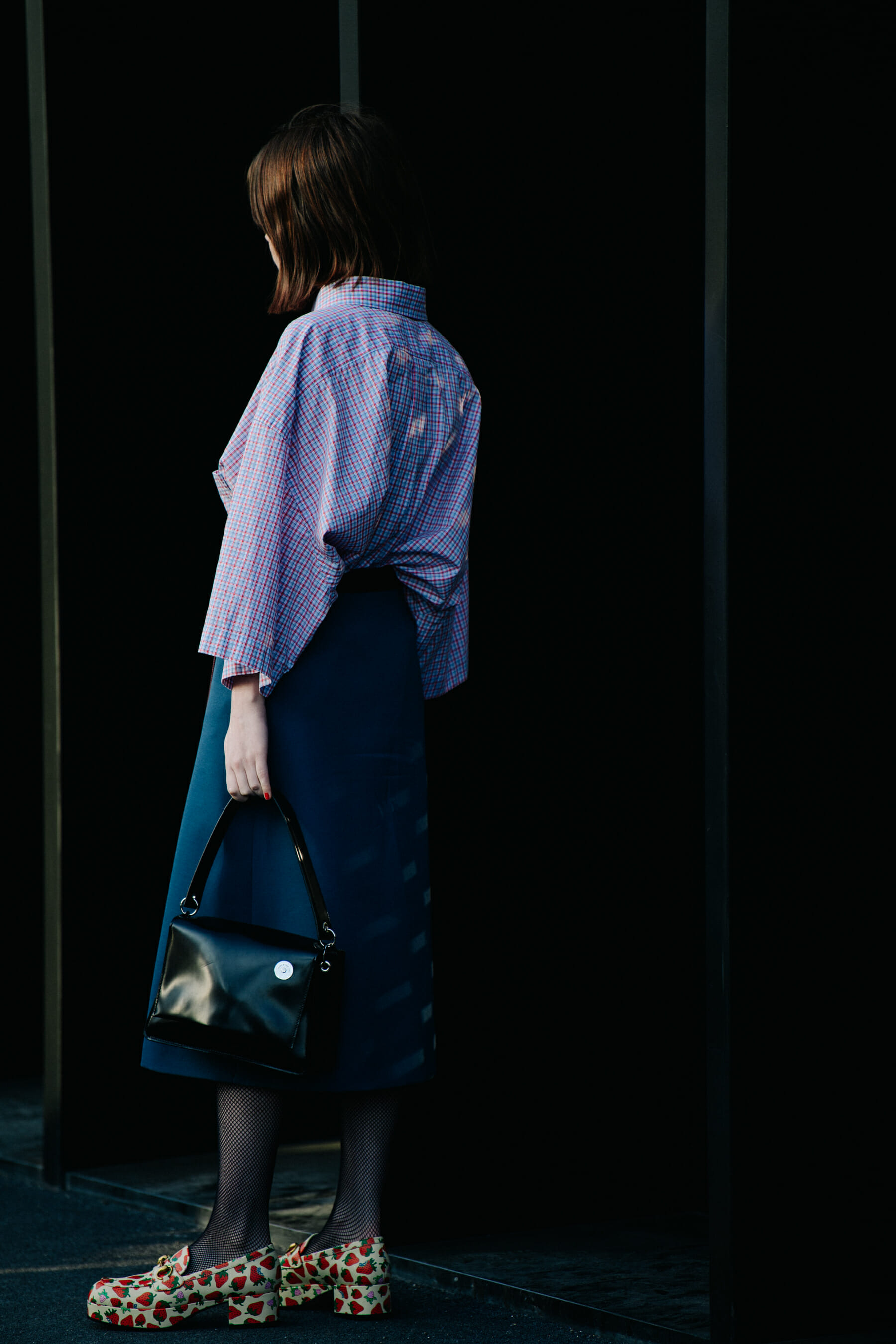 Woman wearing fruit print shoes