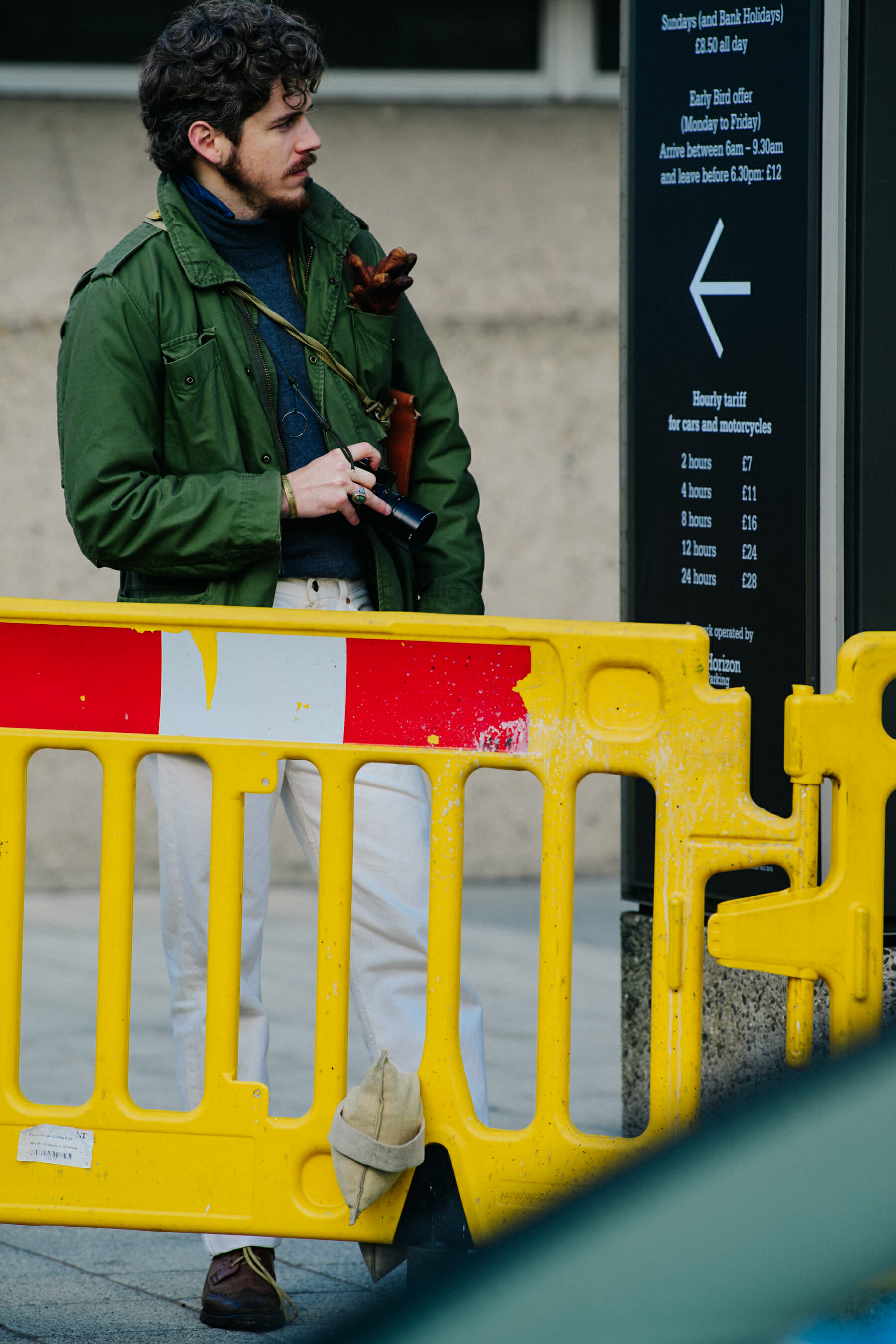 Man wearing green military jacket