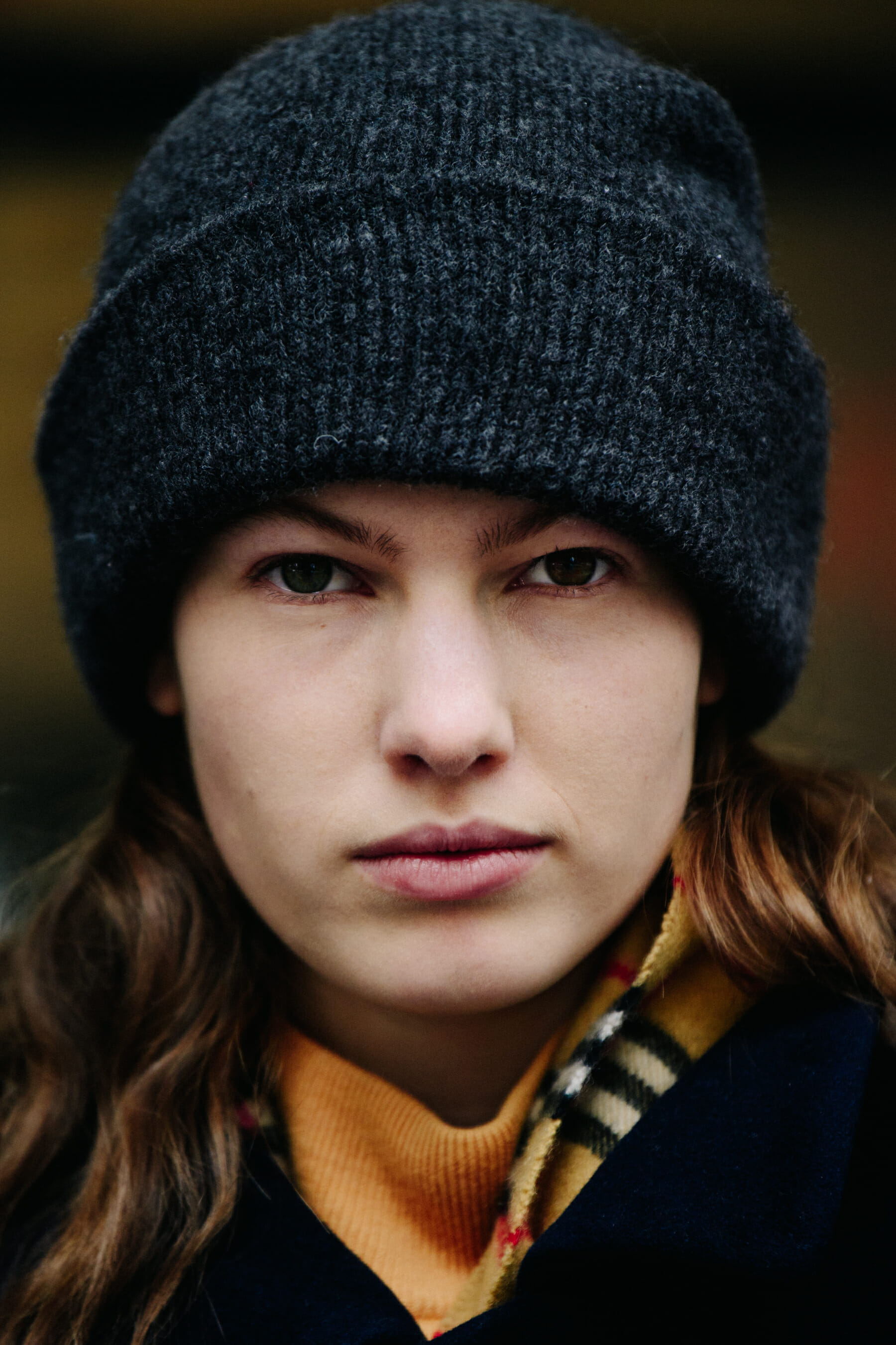 Portrait of model wearing grey beanie