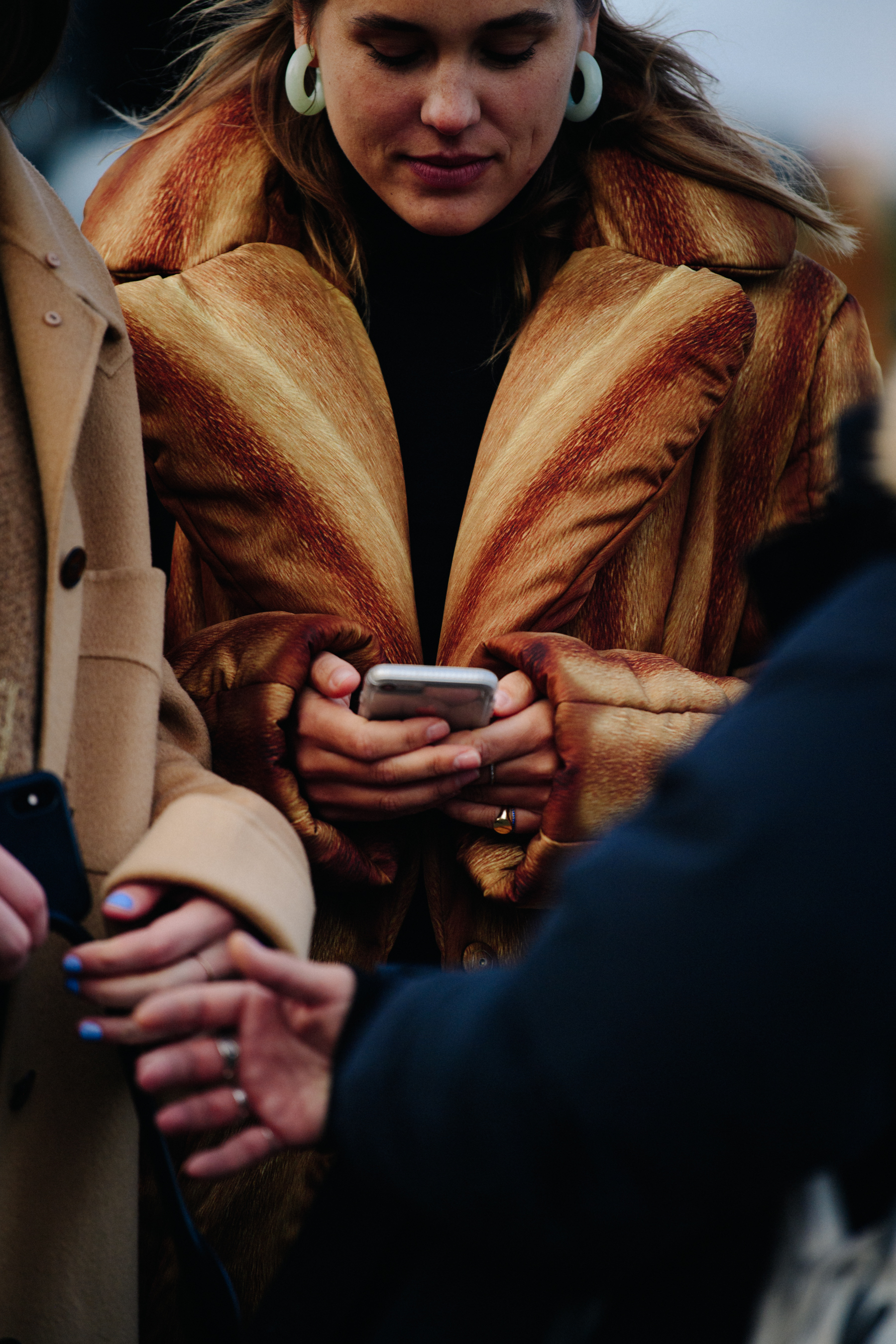 Dutch woman wearing brown coat