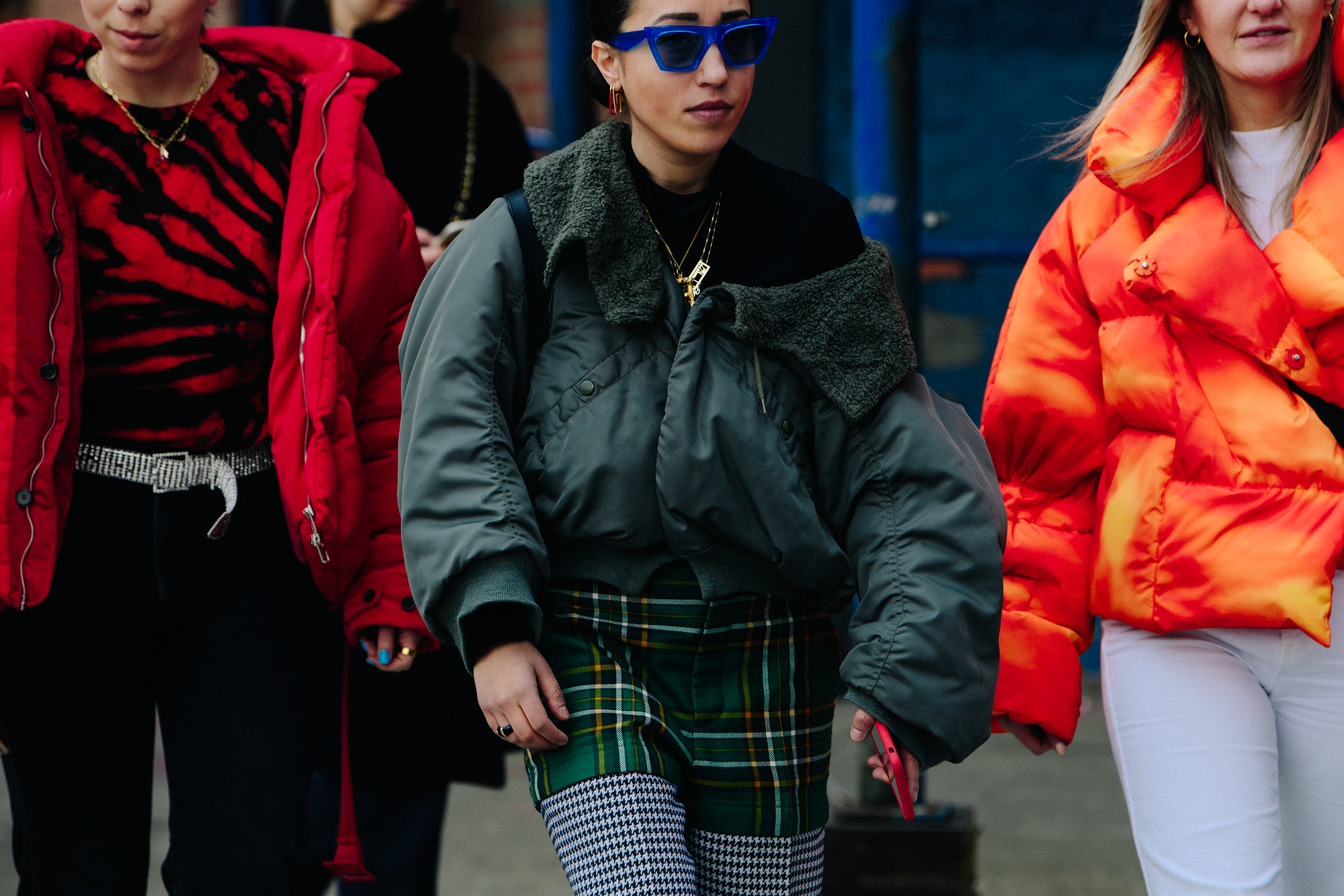 Woman wearing blue sunglasses