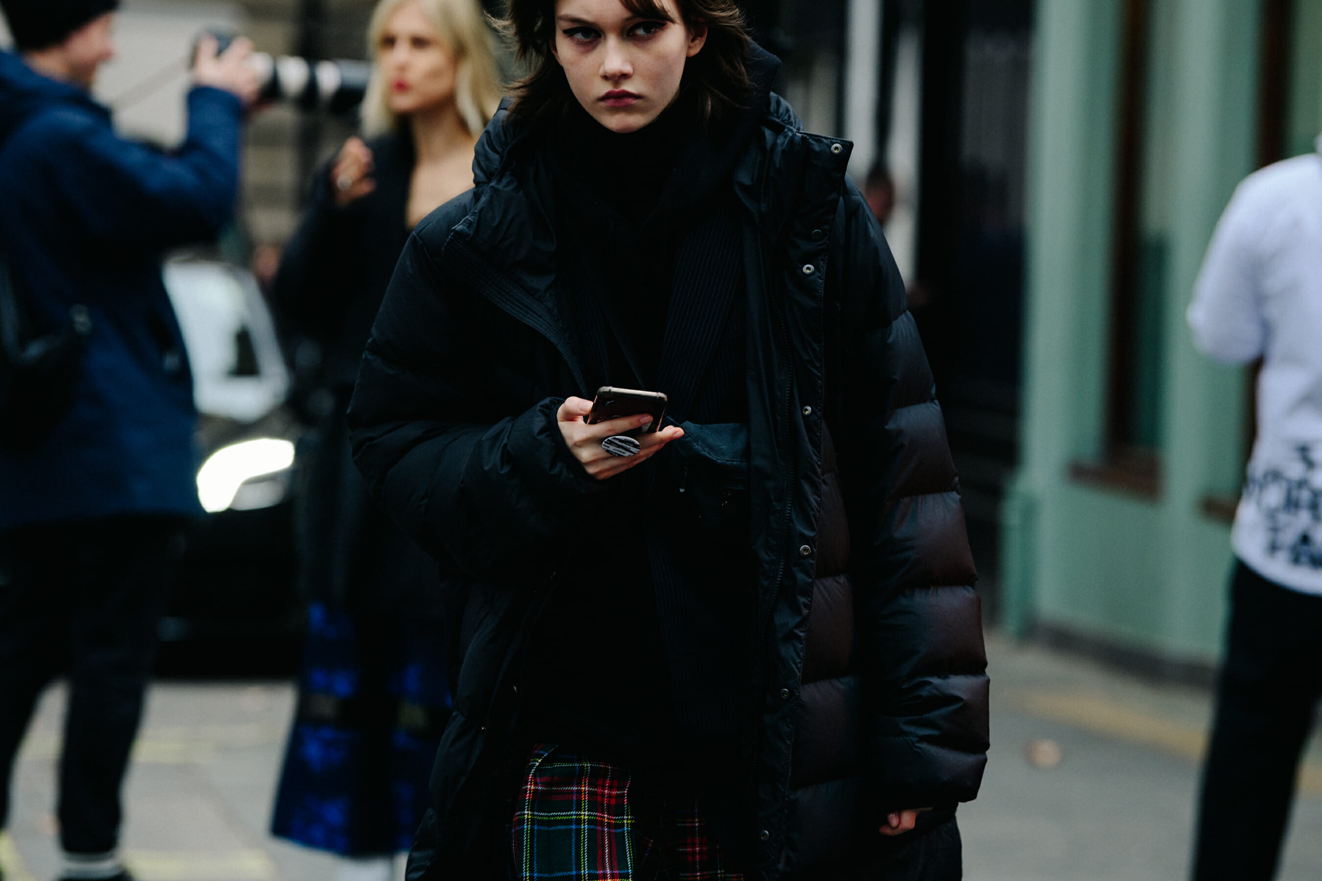 Model wearing check skirt