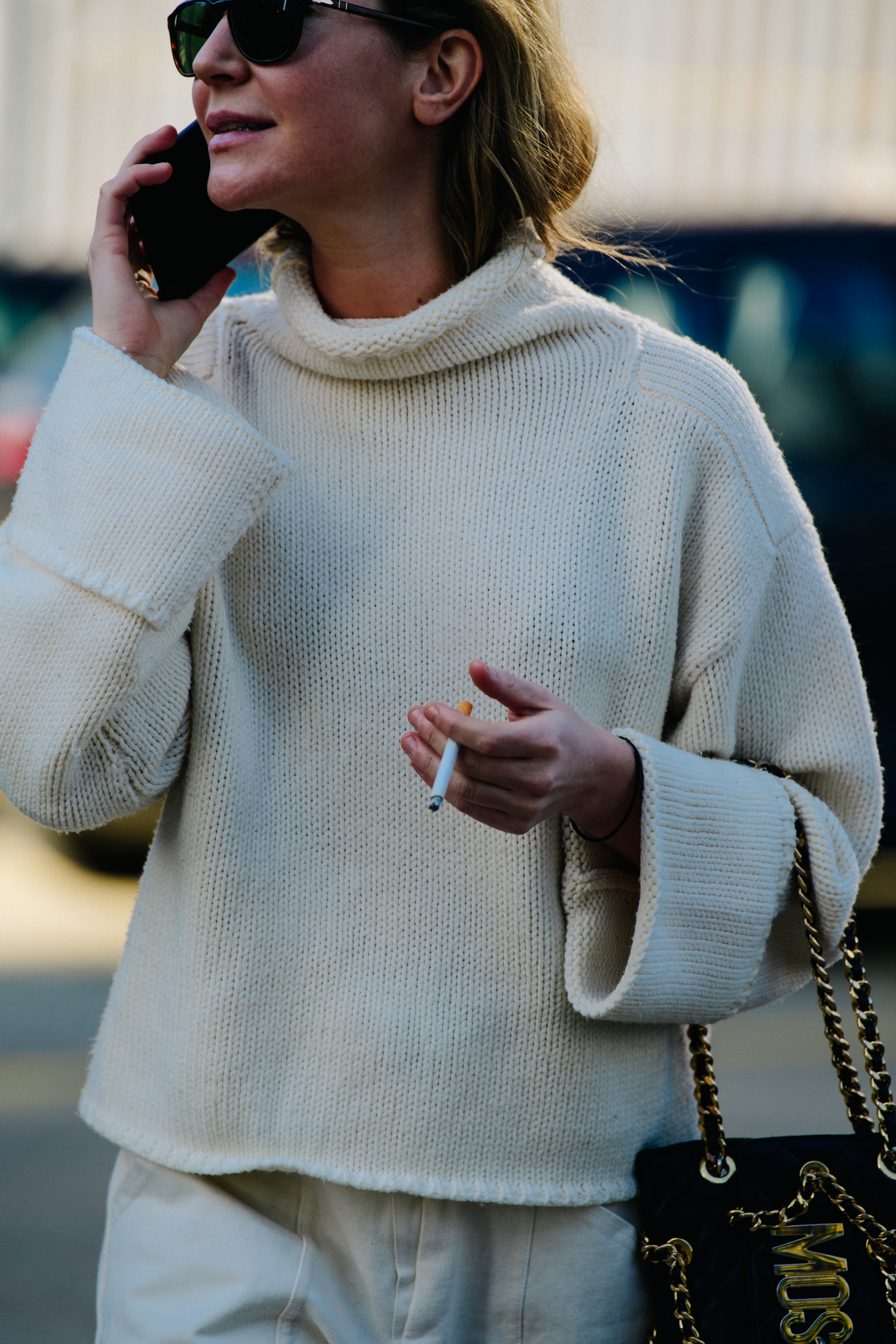 Woman wearing white jumper