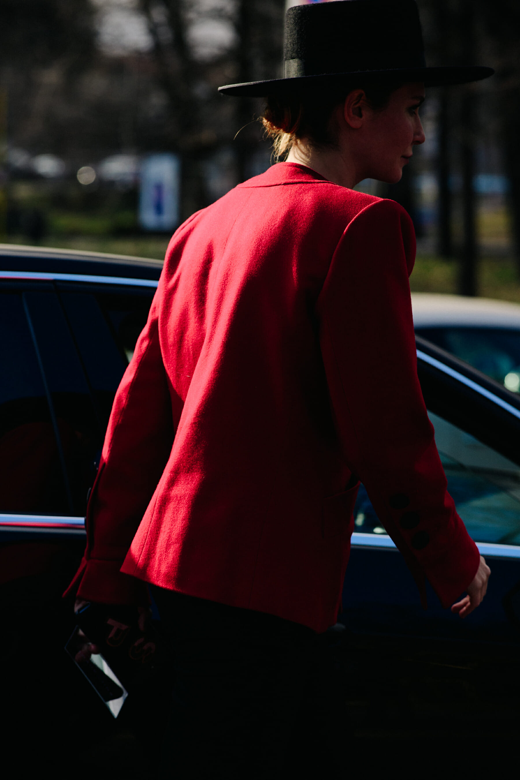 Woman wearing black hat