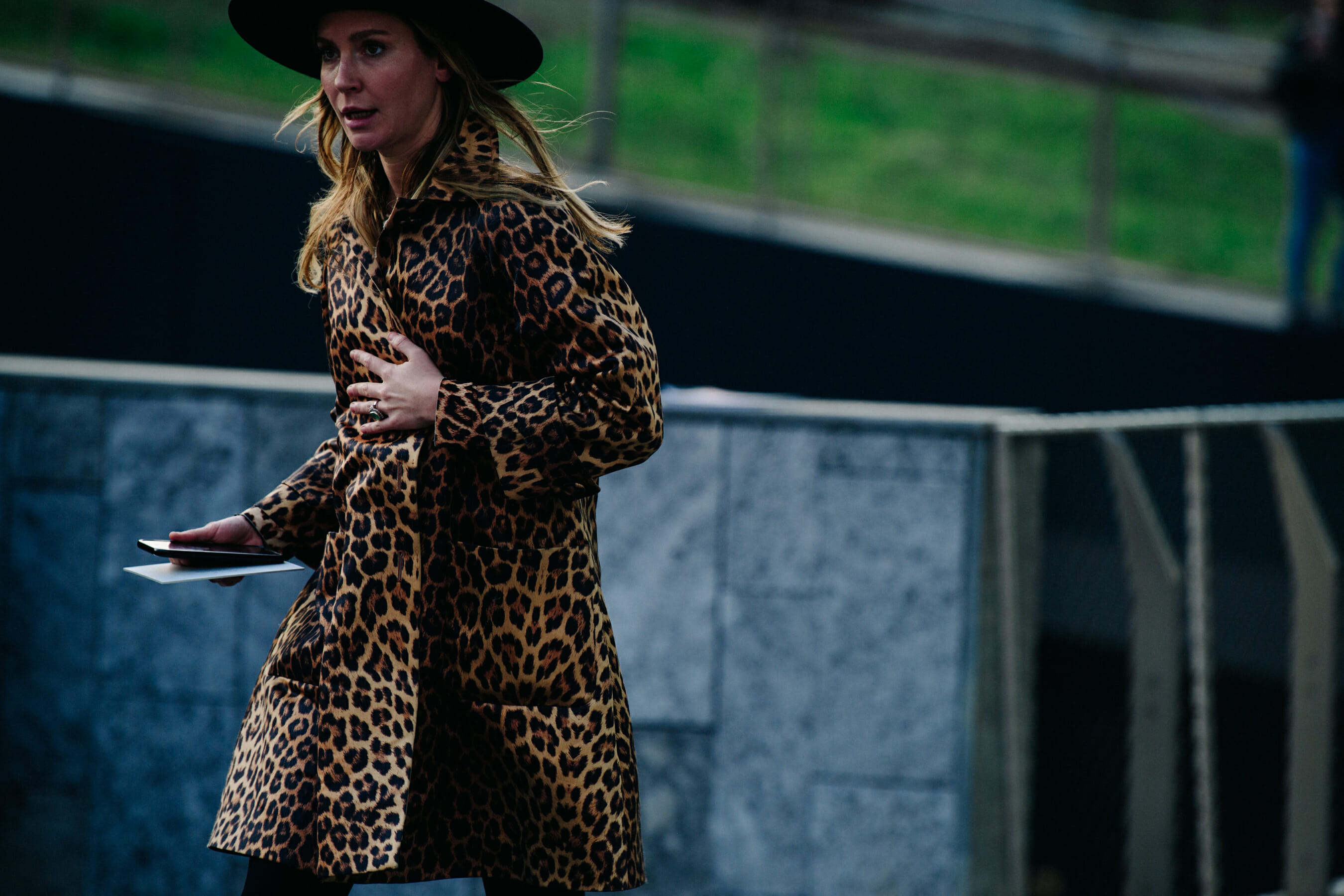 Woman wearing animal print coat