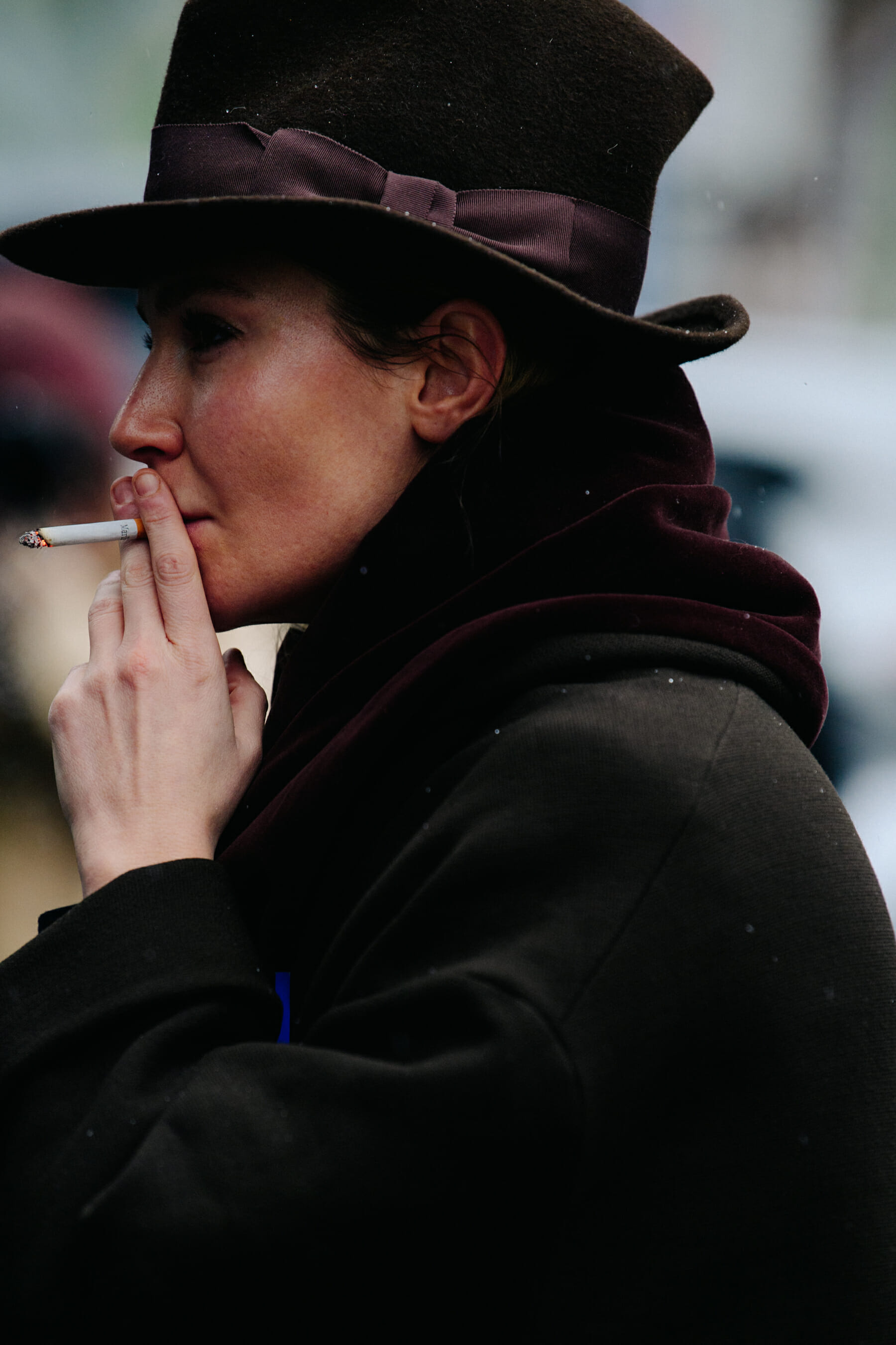 Woman wearing green wool hat