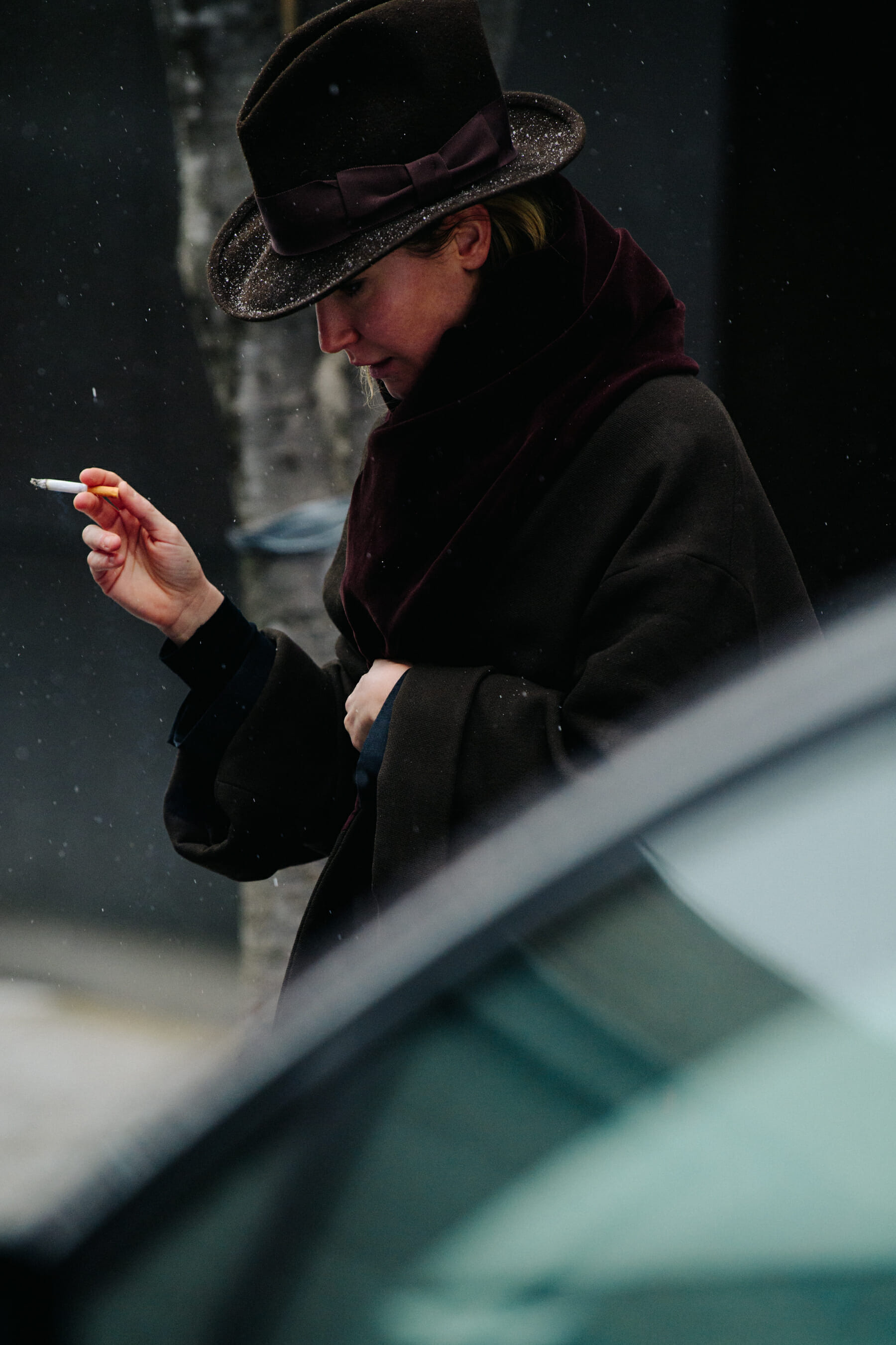 Woman wearing green wool hat