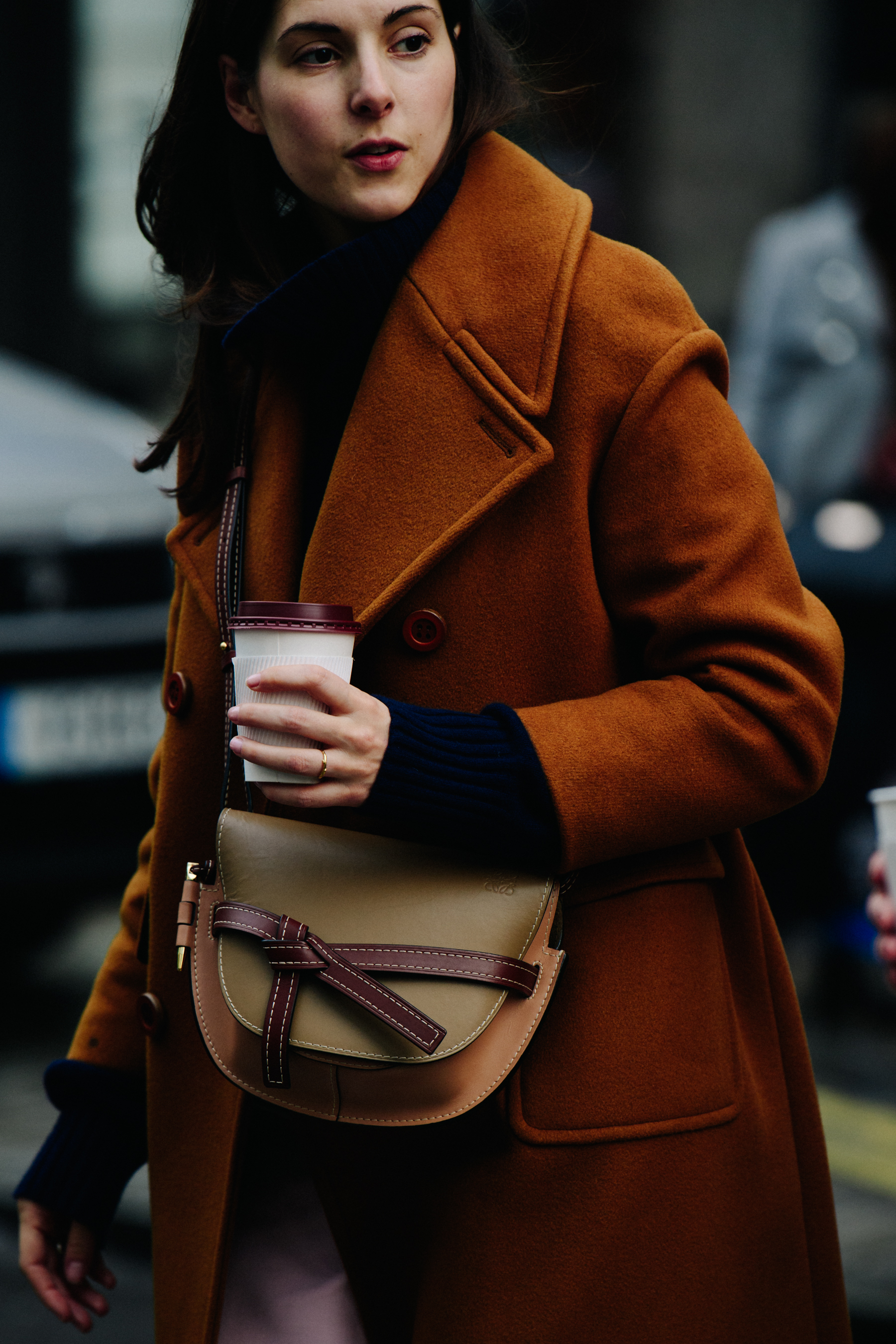 Woman wearing brown wool coat