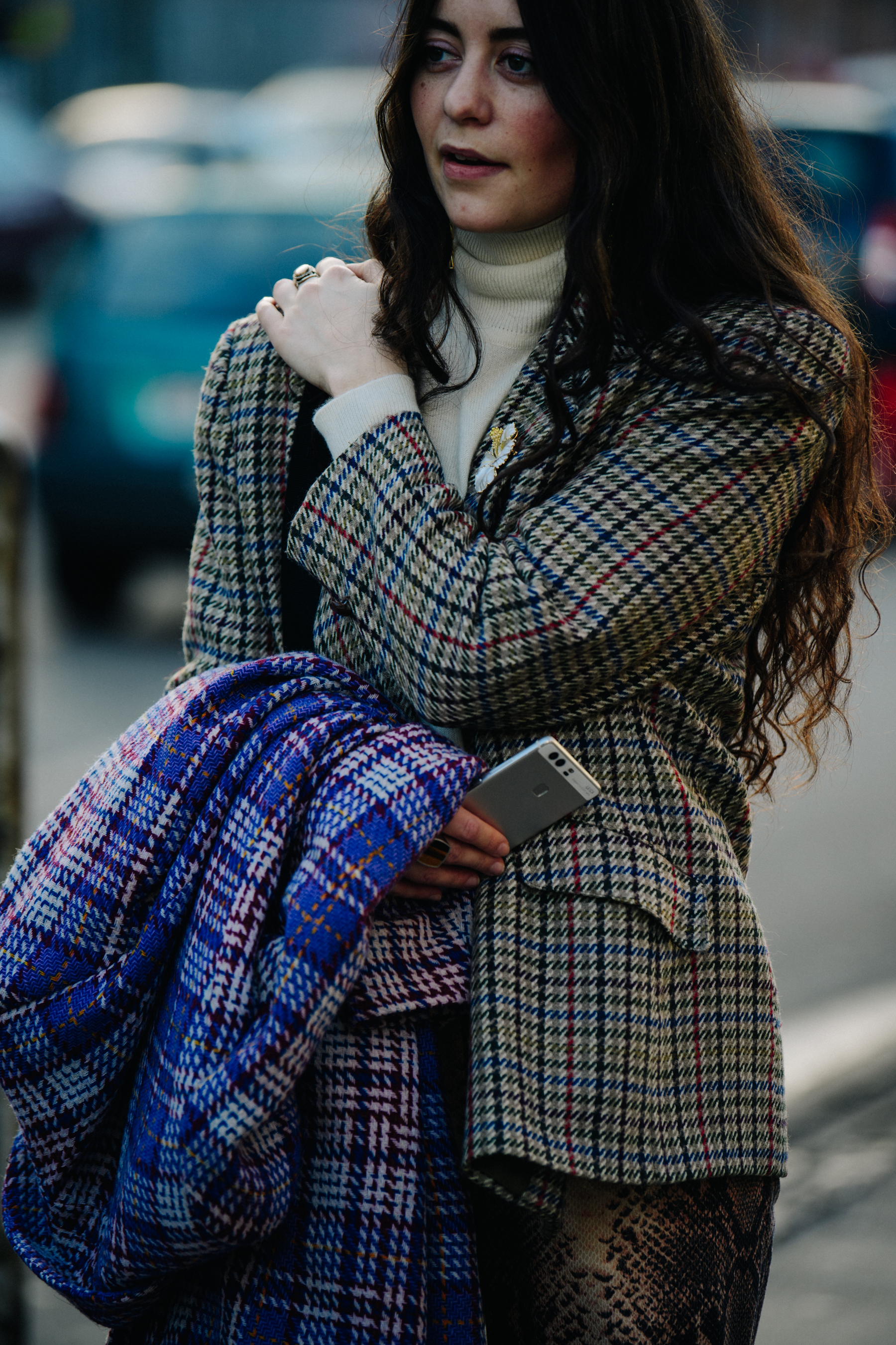 Woman wearing check jacket