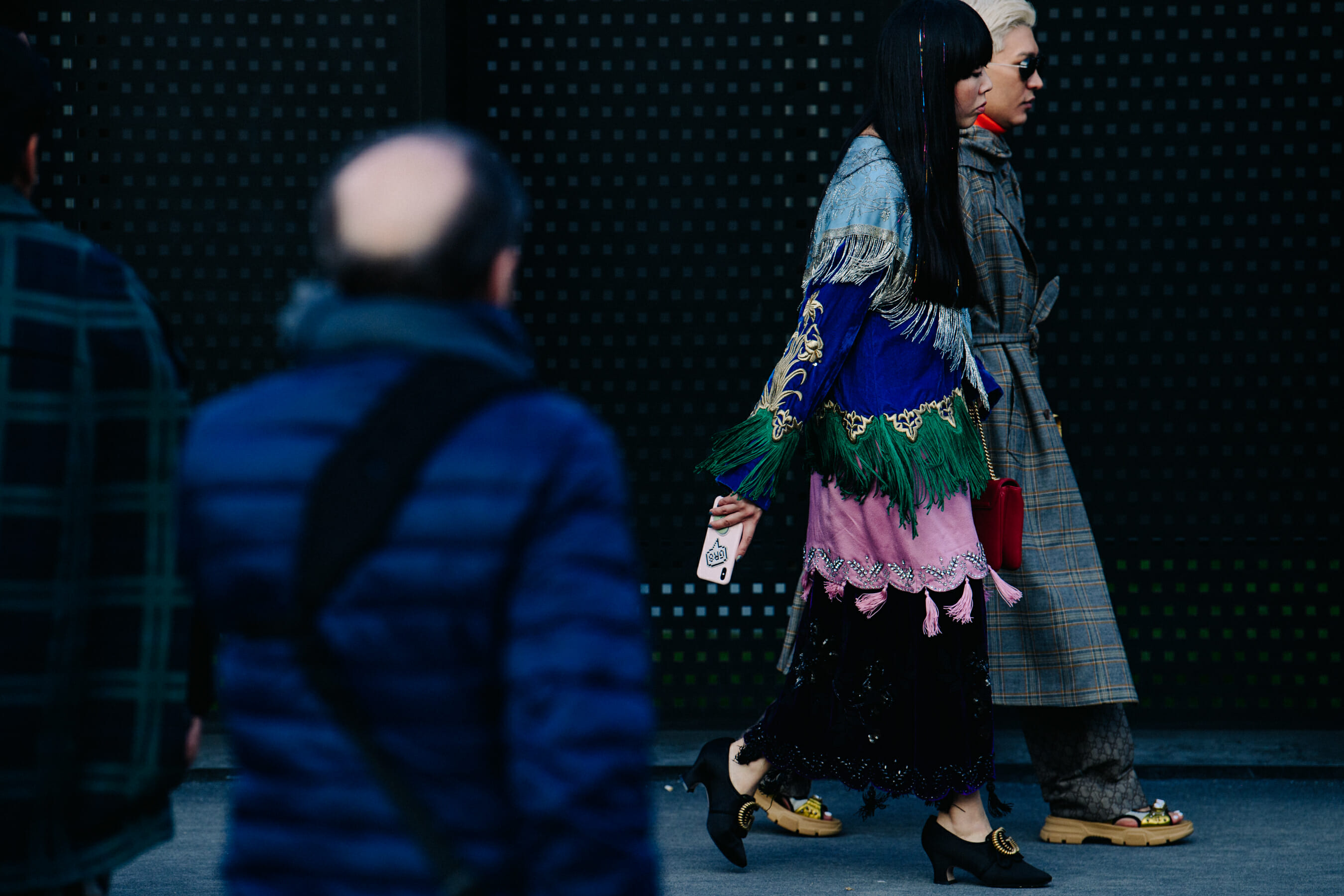 Couple wearing interesting coats