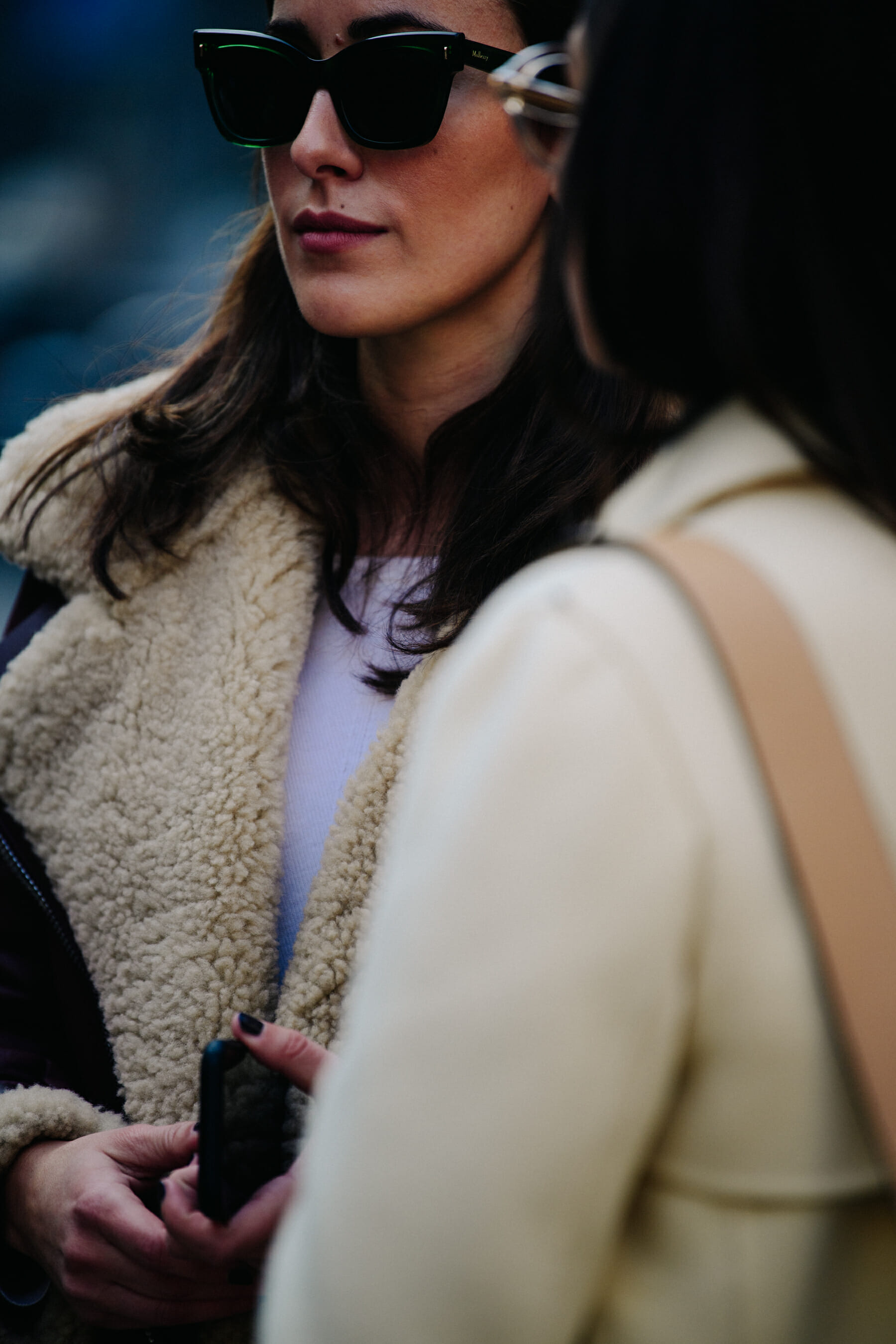 Woman wearing shearling jacket