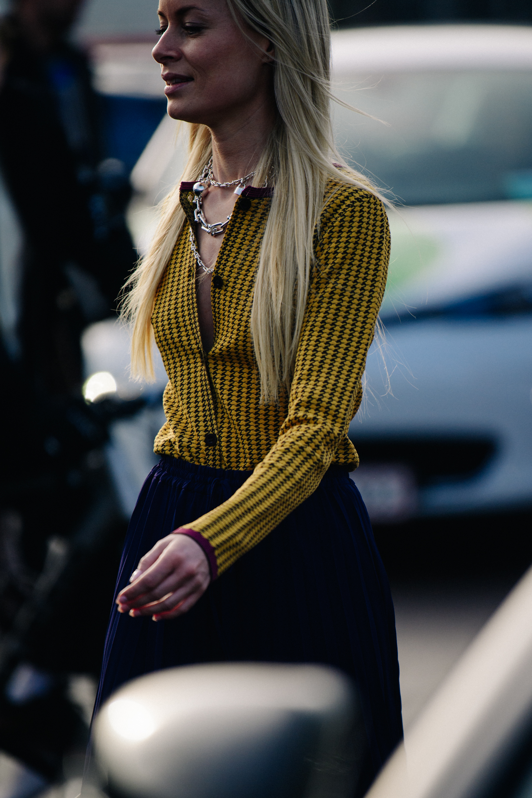 Woman wearing silver necklaces