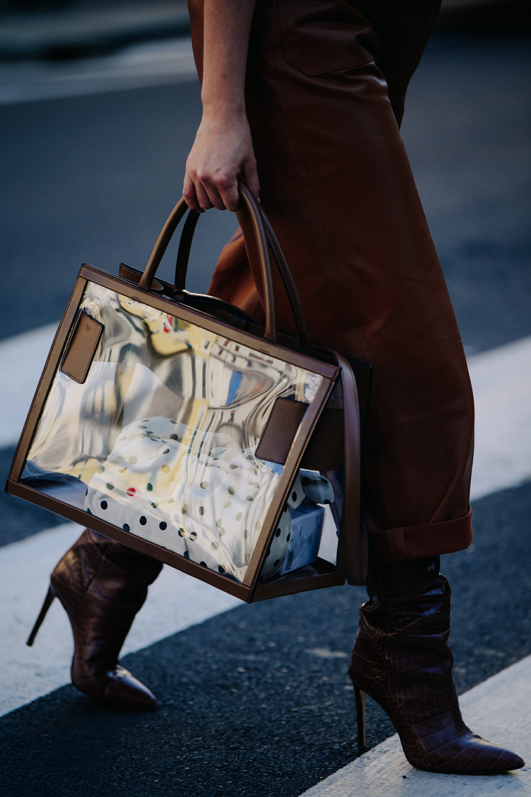 Woman carrying plastic bag