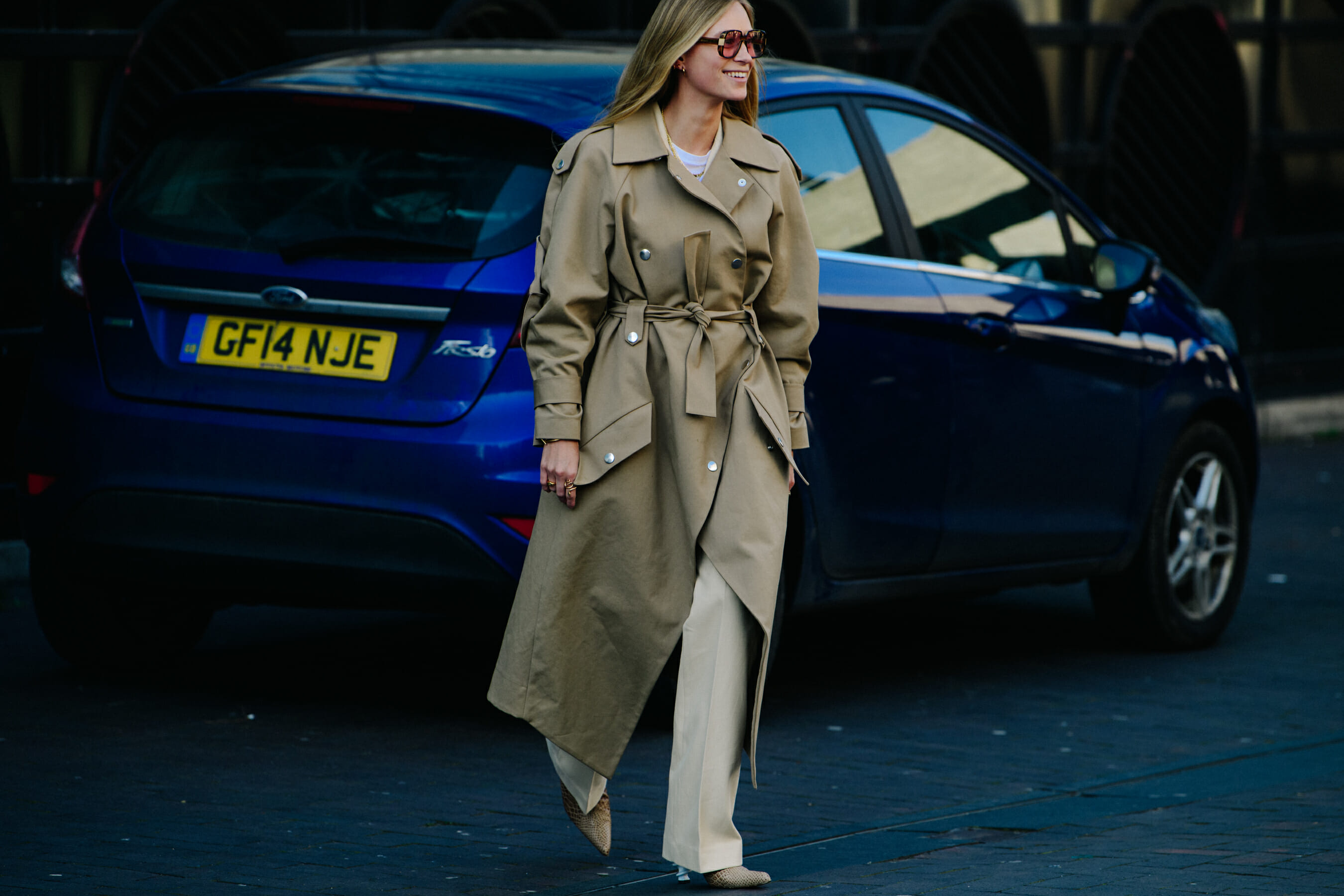 Blogger wearing tan coat