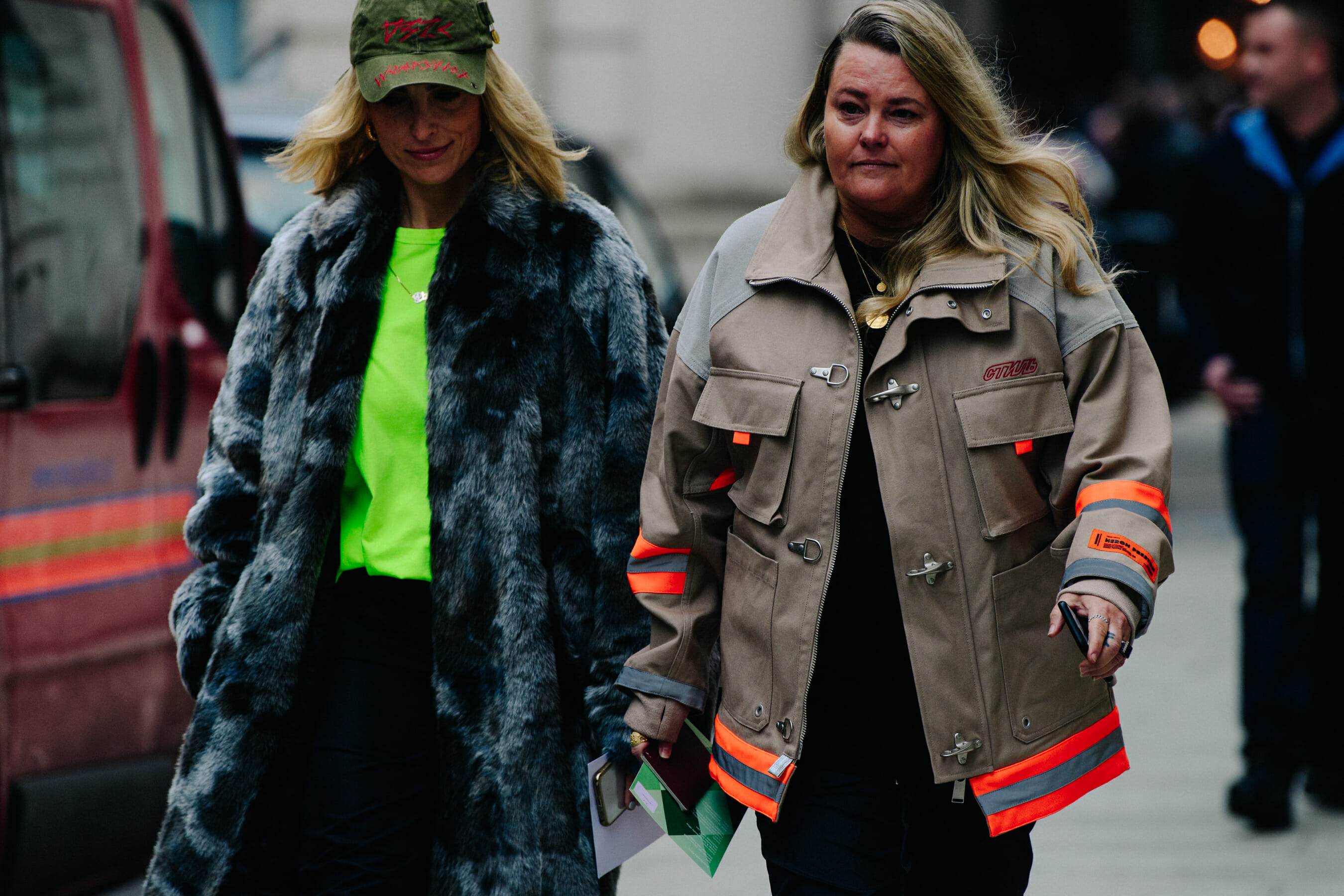 Two women wearing winter coats