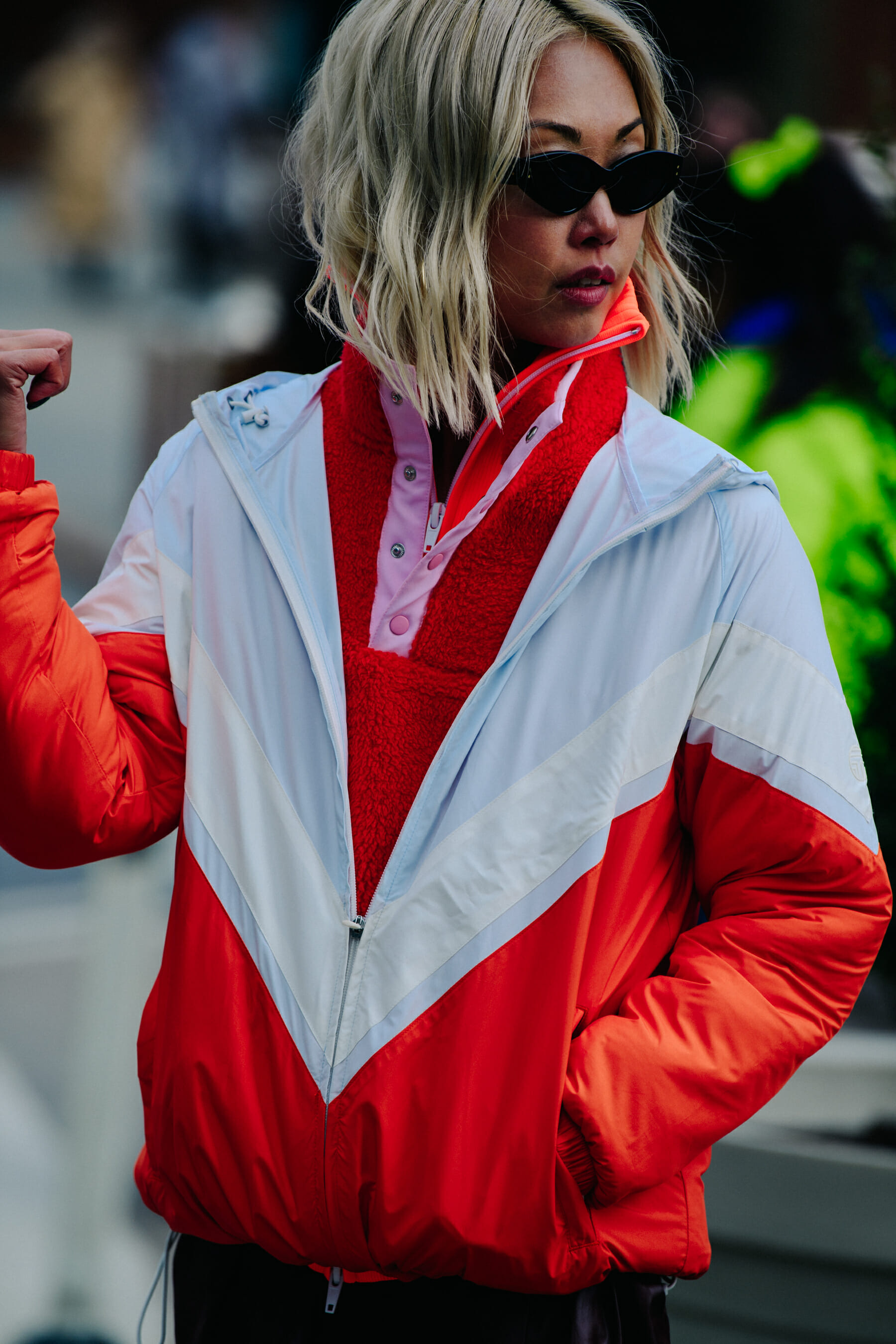 Asian woman wearing red sports top