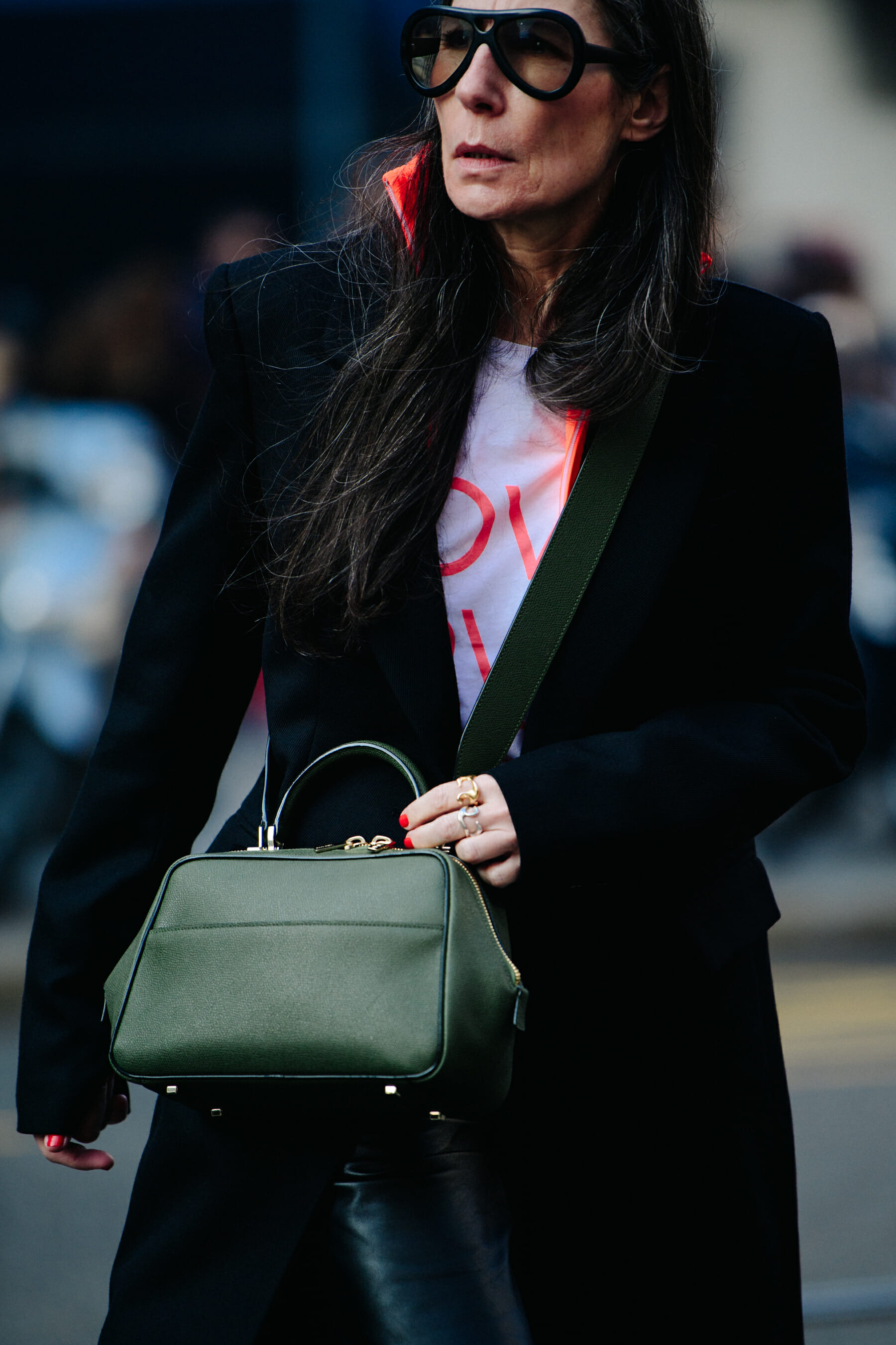 Woman wearing large black glasses