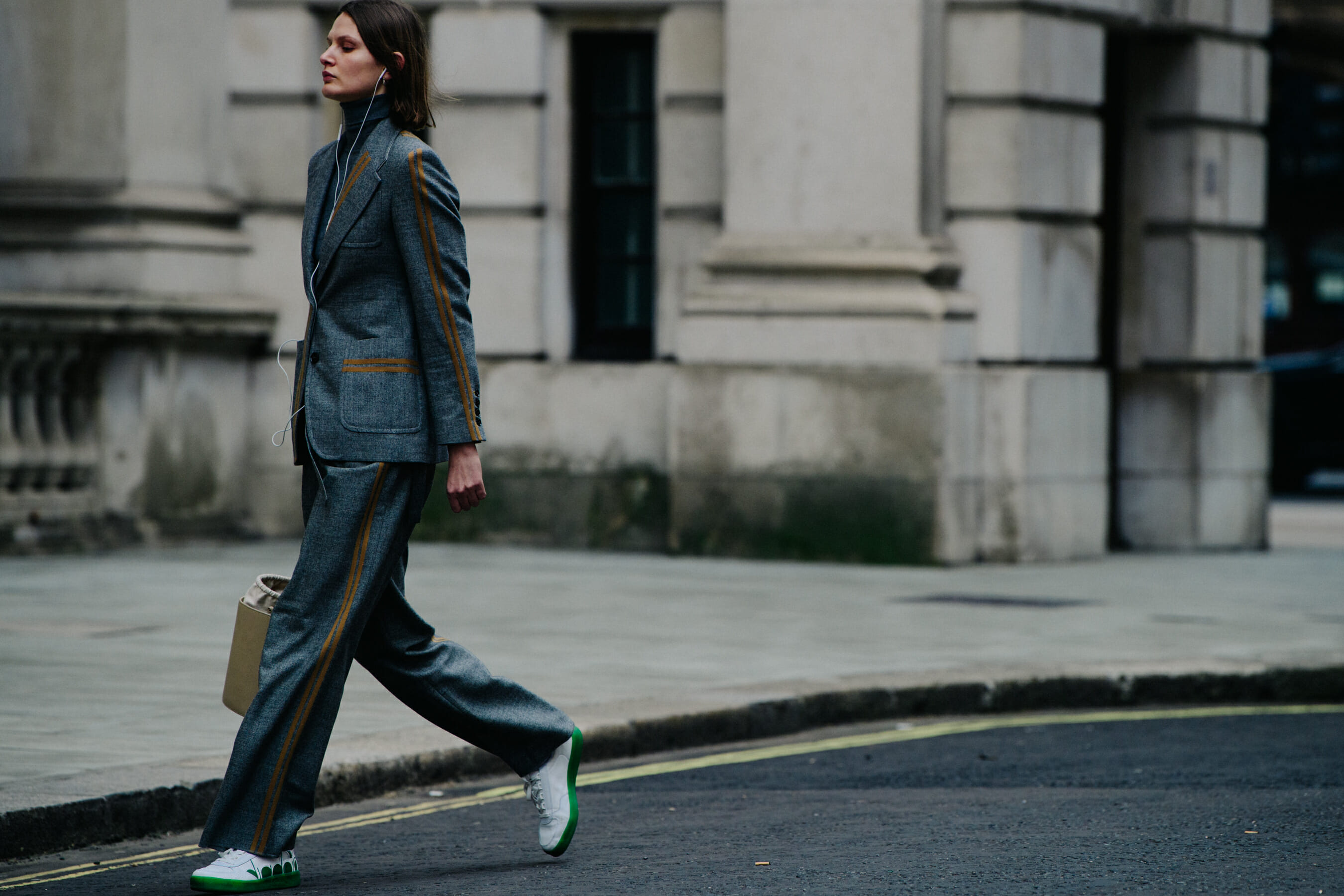 Woman wearing grey suit