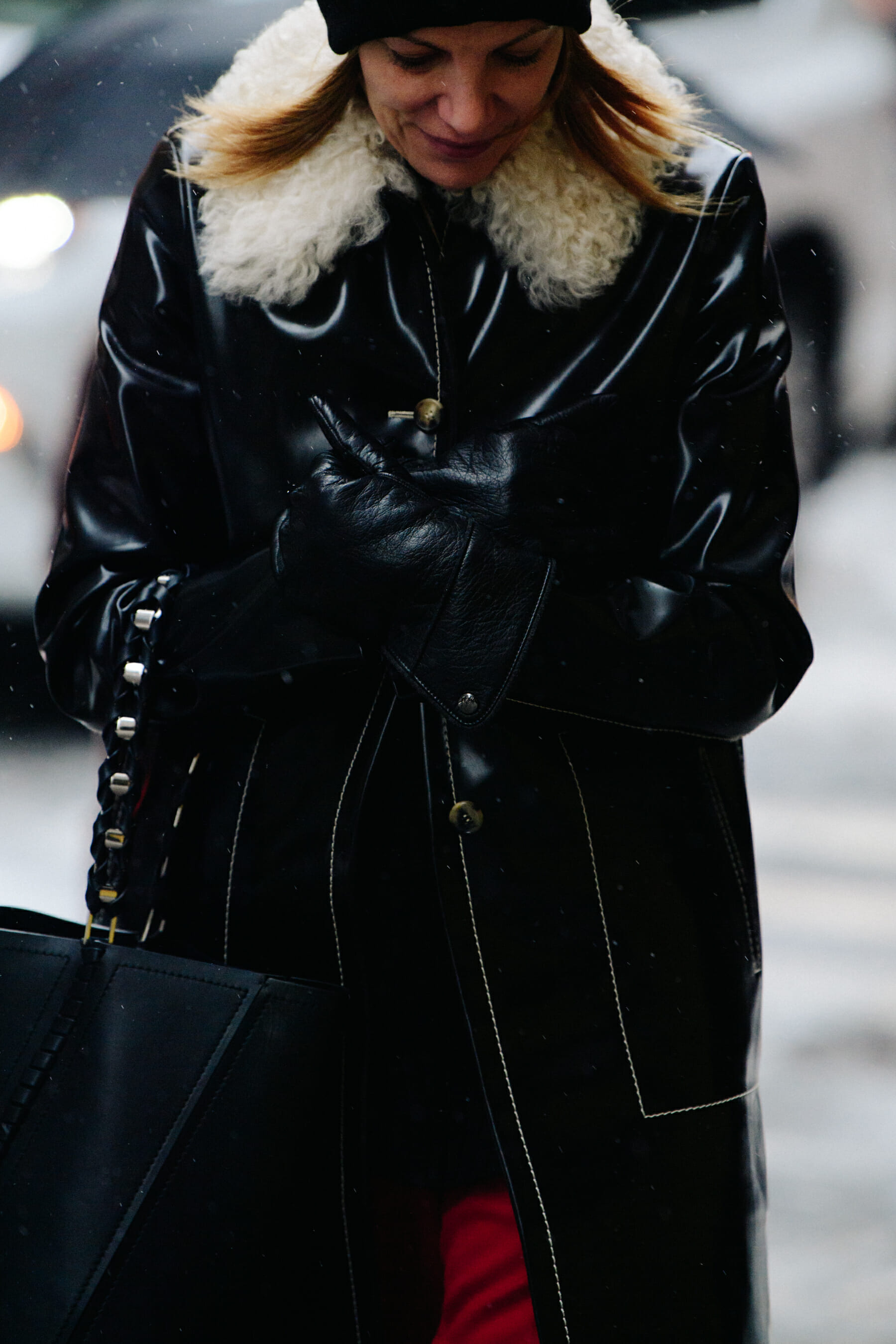 Woman wearing black winter coat