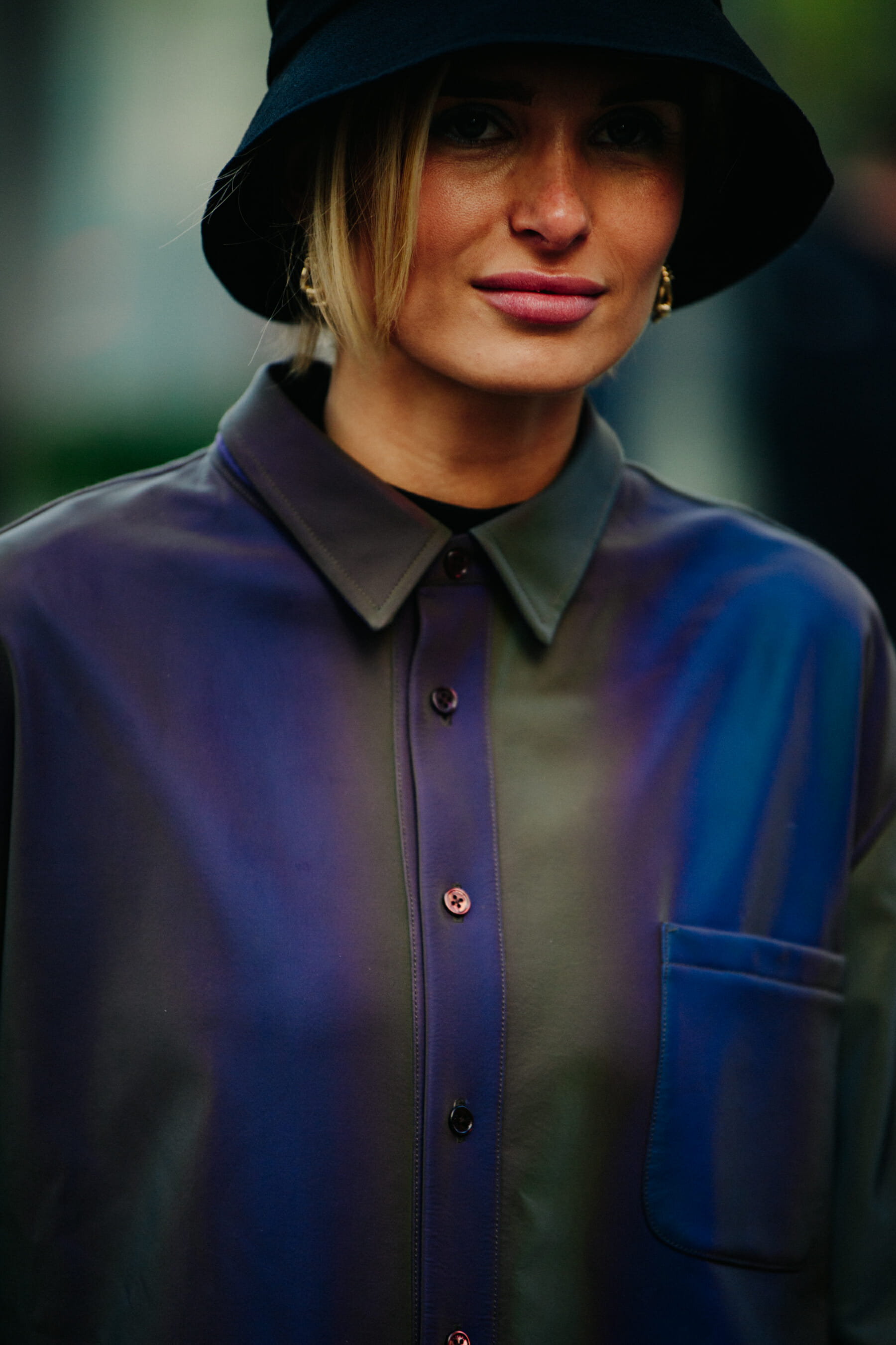 Blogger wearing purple shirt