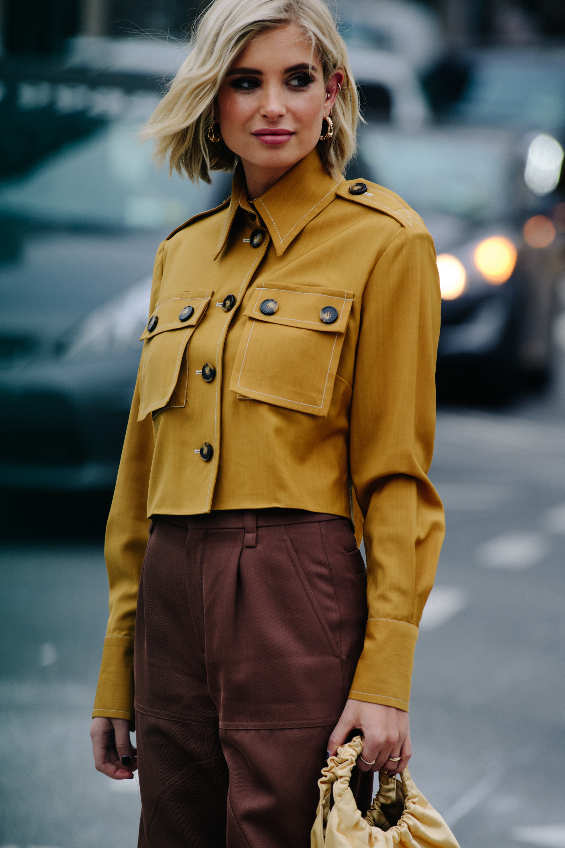 Blogger wearing yellow shirt