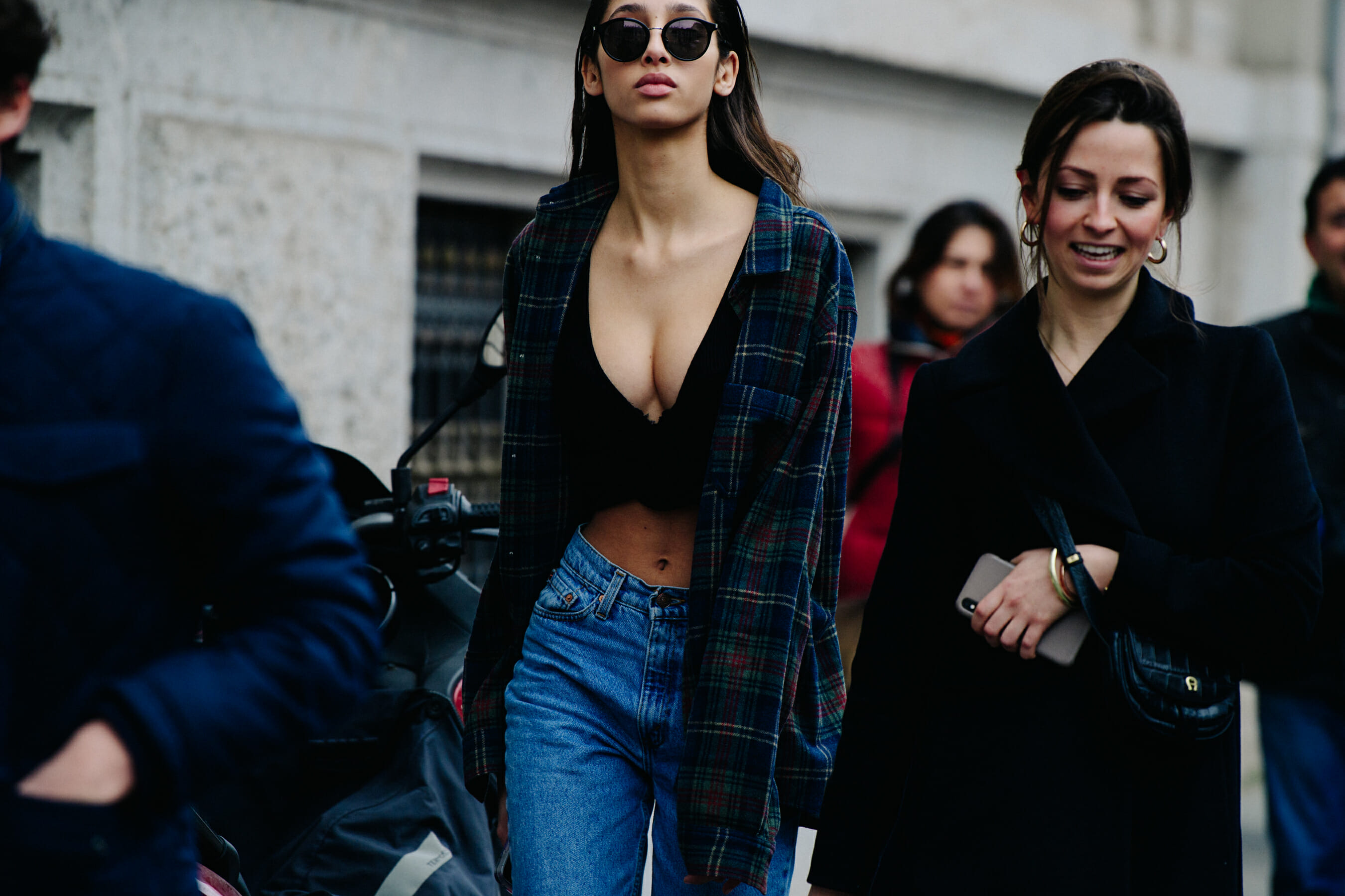 Model wearing check shirt