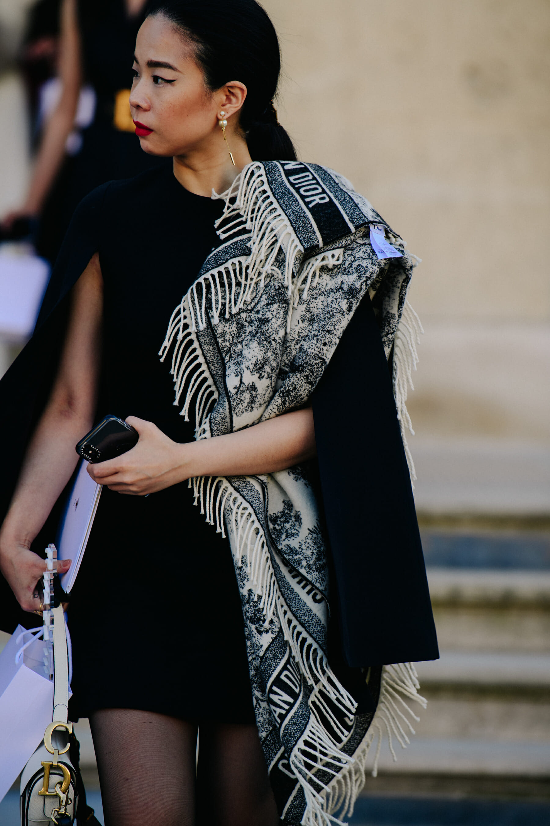 Woman wearing Christian Dior outfit