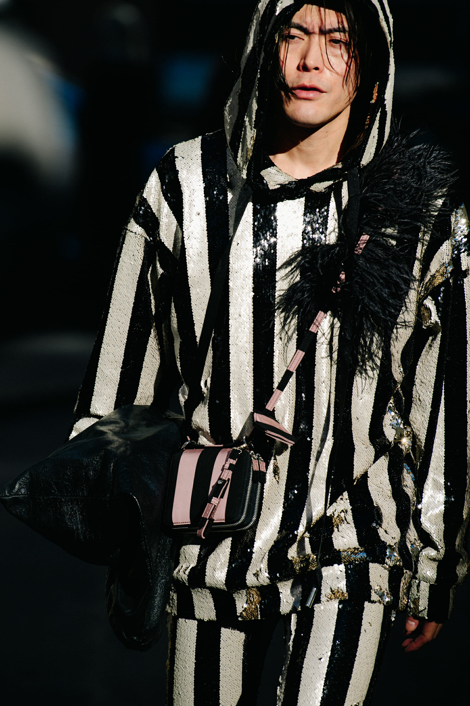 Man wearing striped outfit