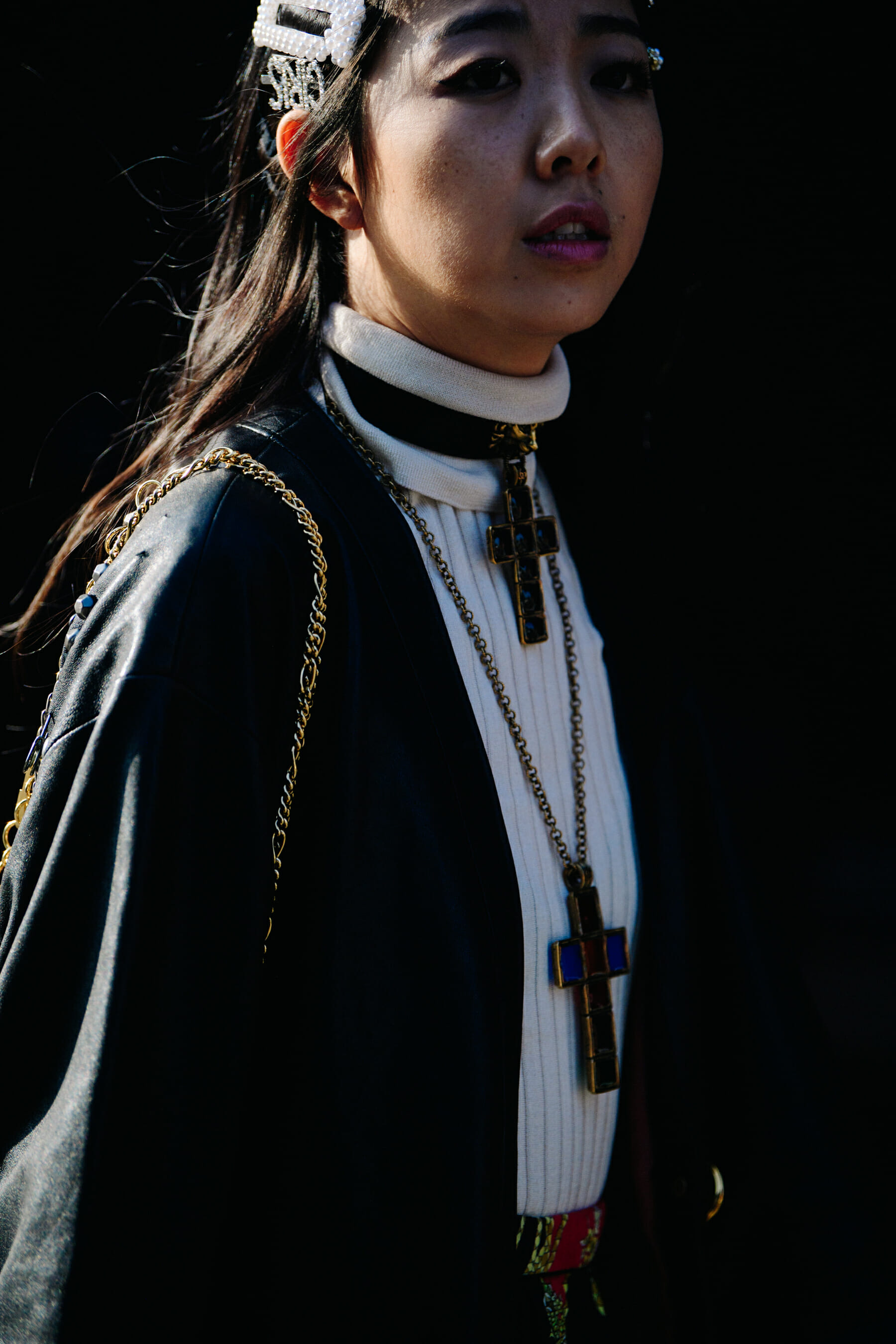 Woman wearing cross necklaces