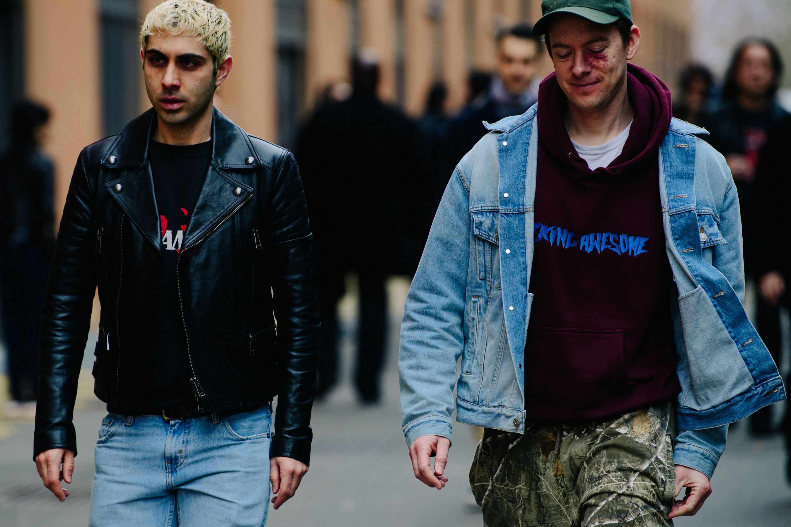 Two men wearing light jackets
