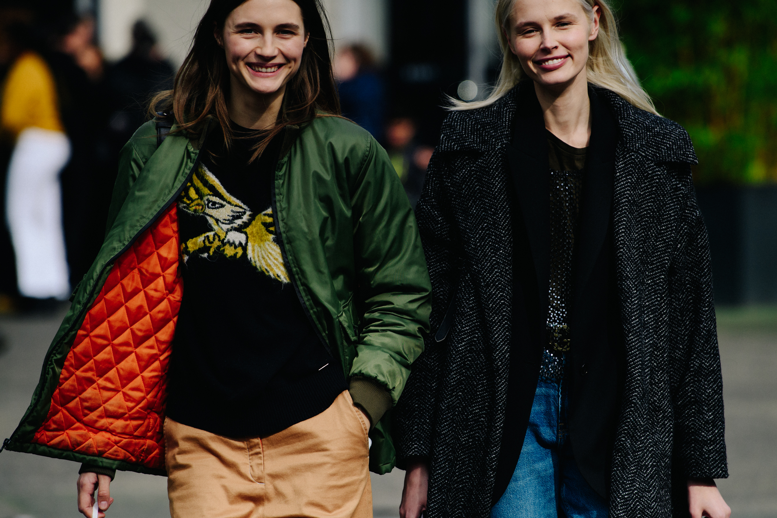 Two models smiling after show