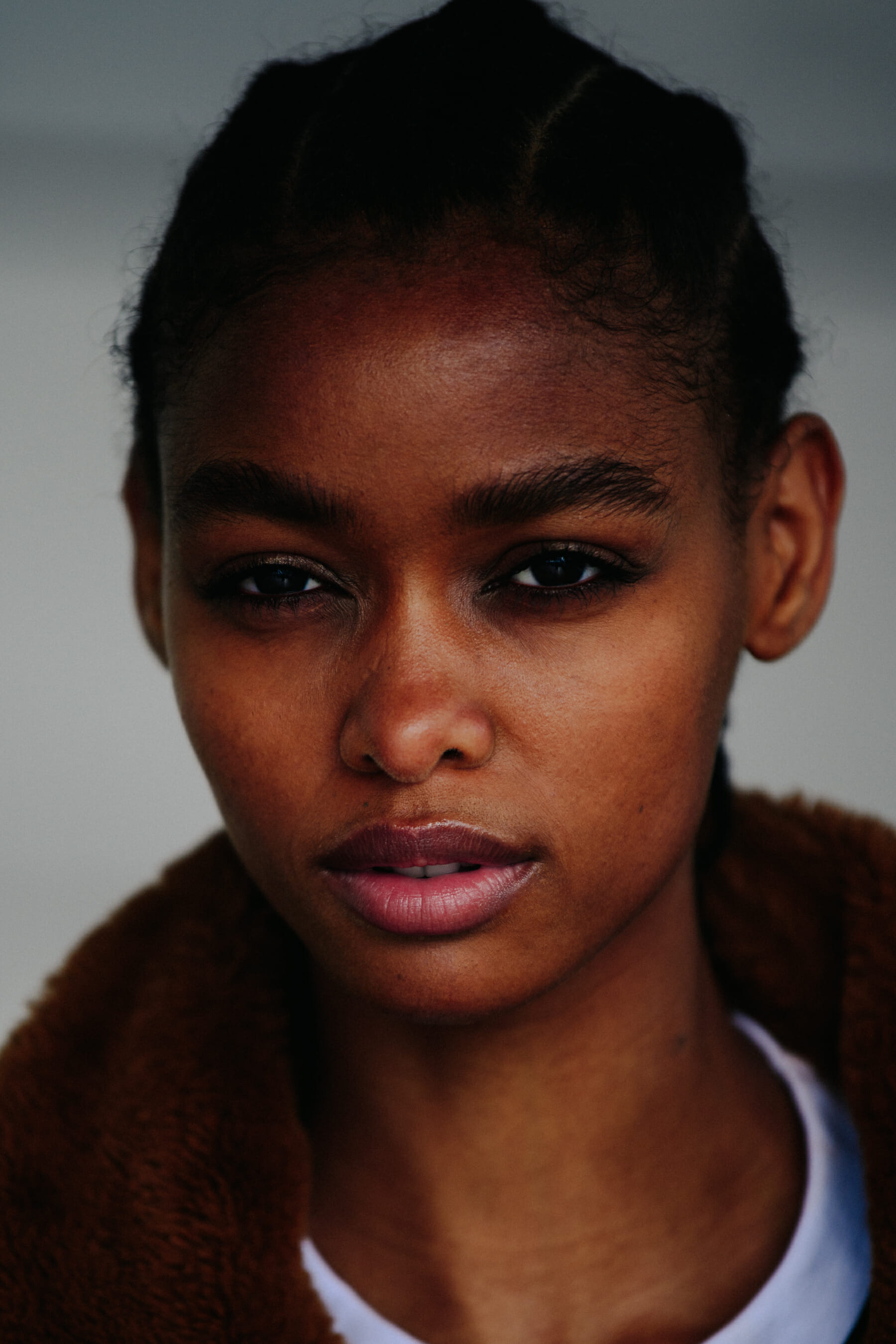 Portrait of model with dark braids