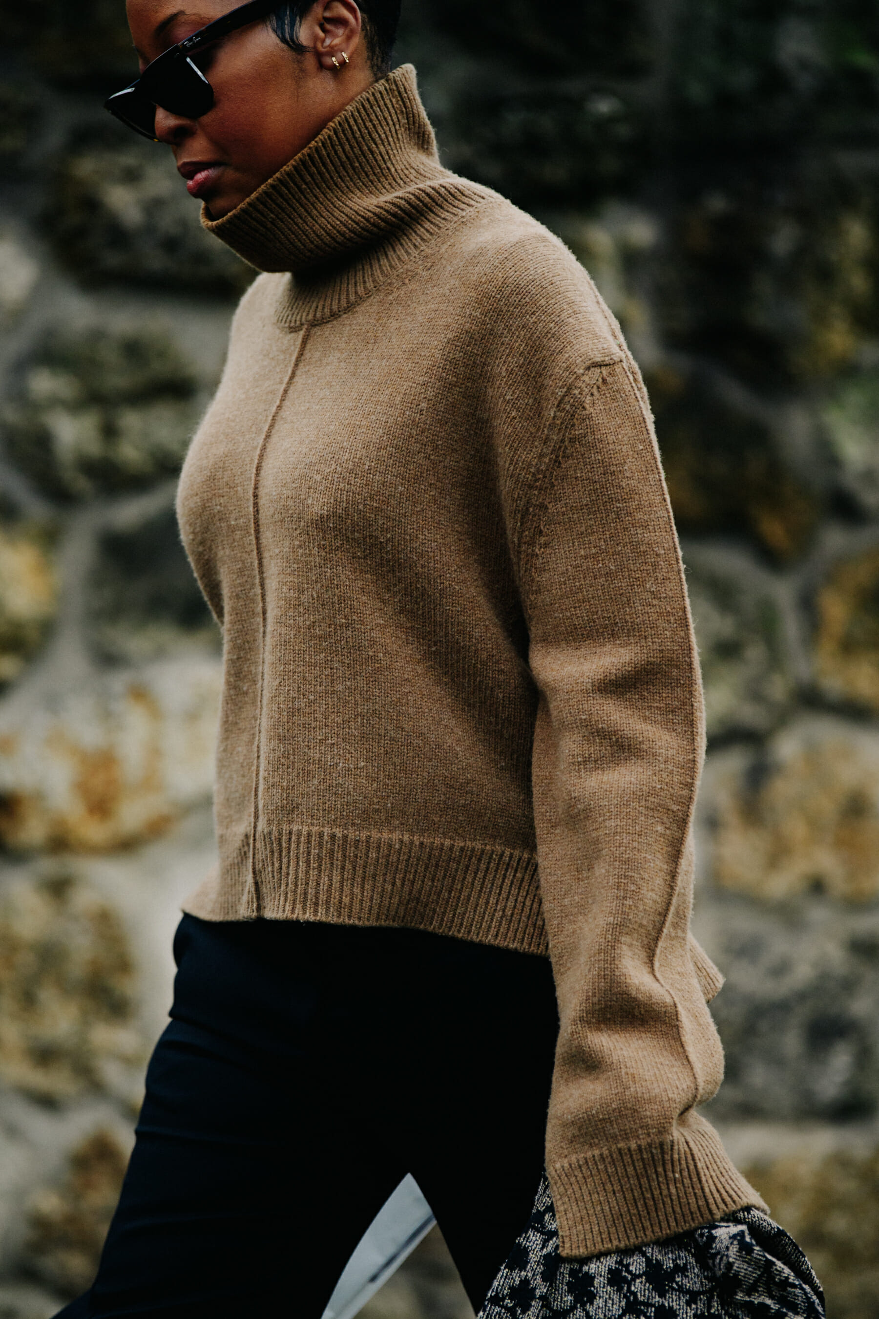 Woman wearing brown wool jumper