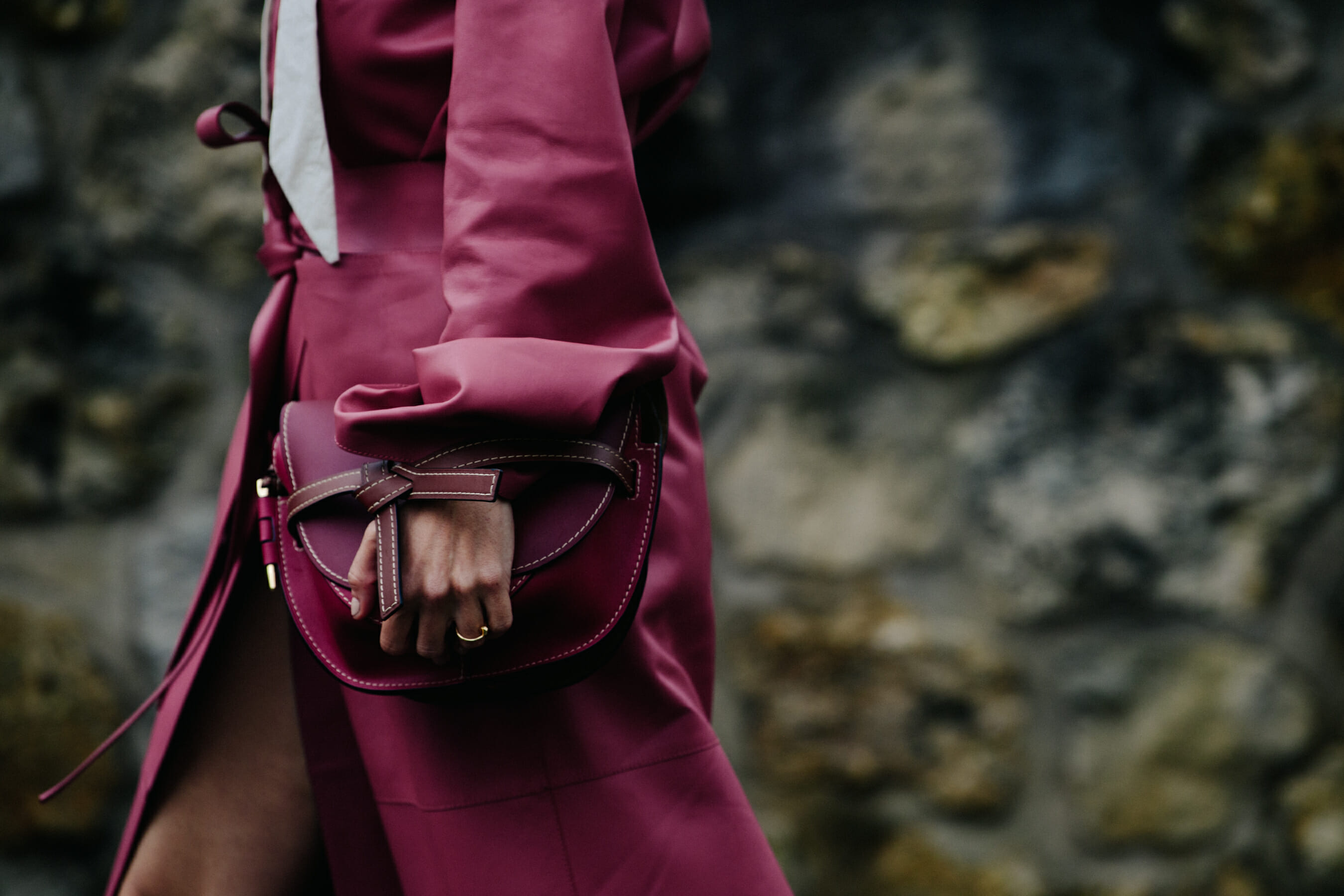 Woman wearing pink leather coat