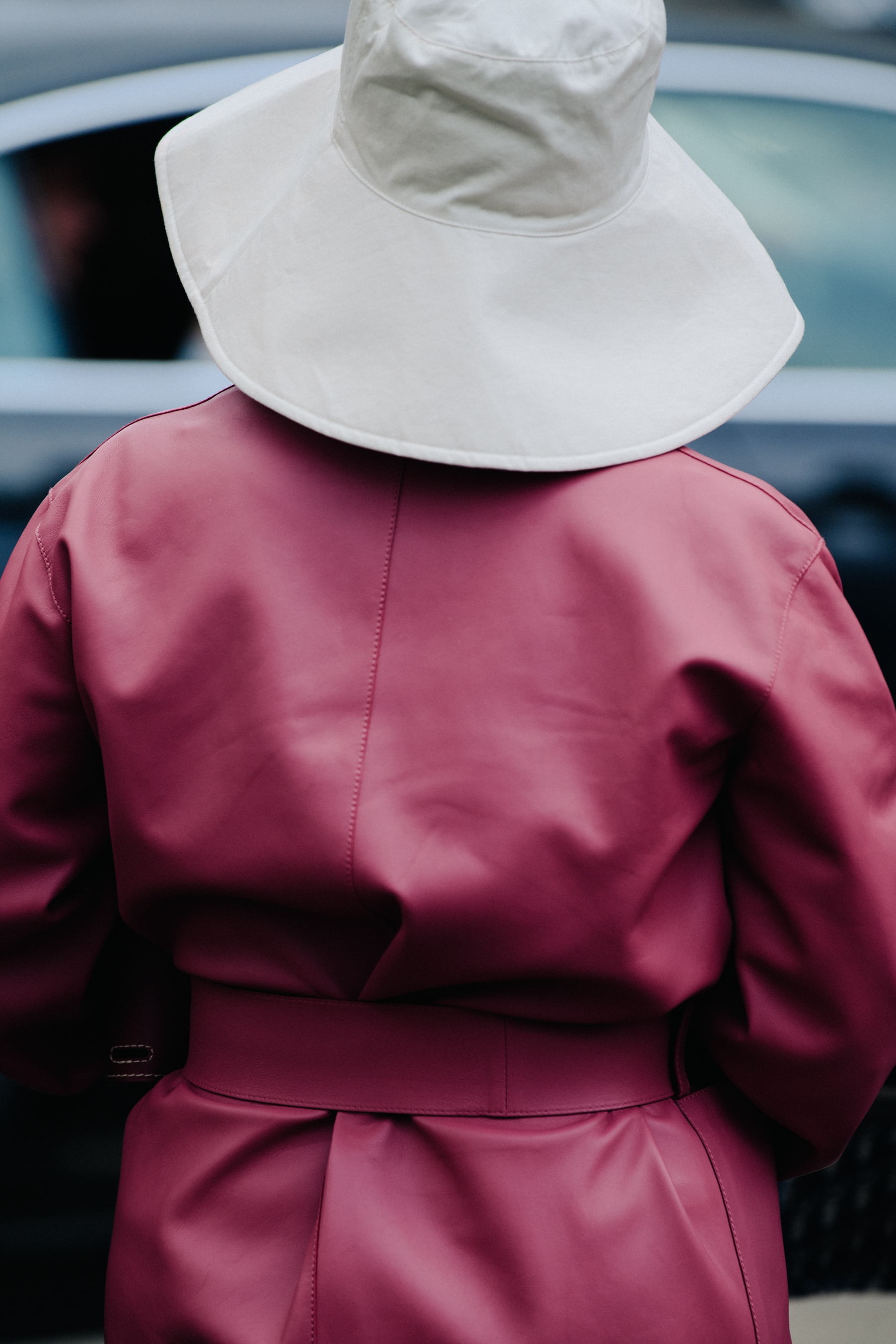 Woman wearing pink leather coat