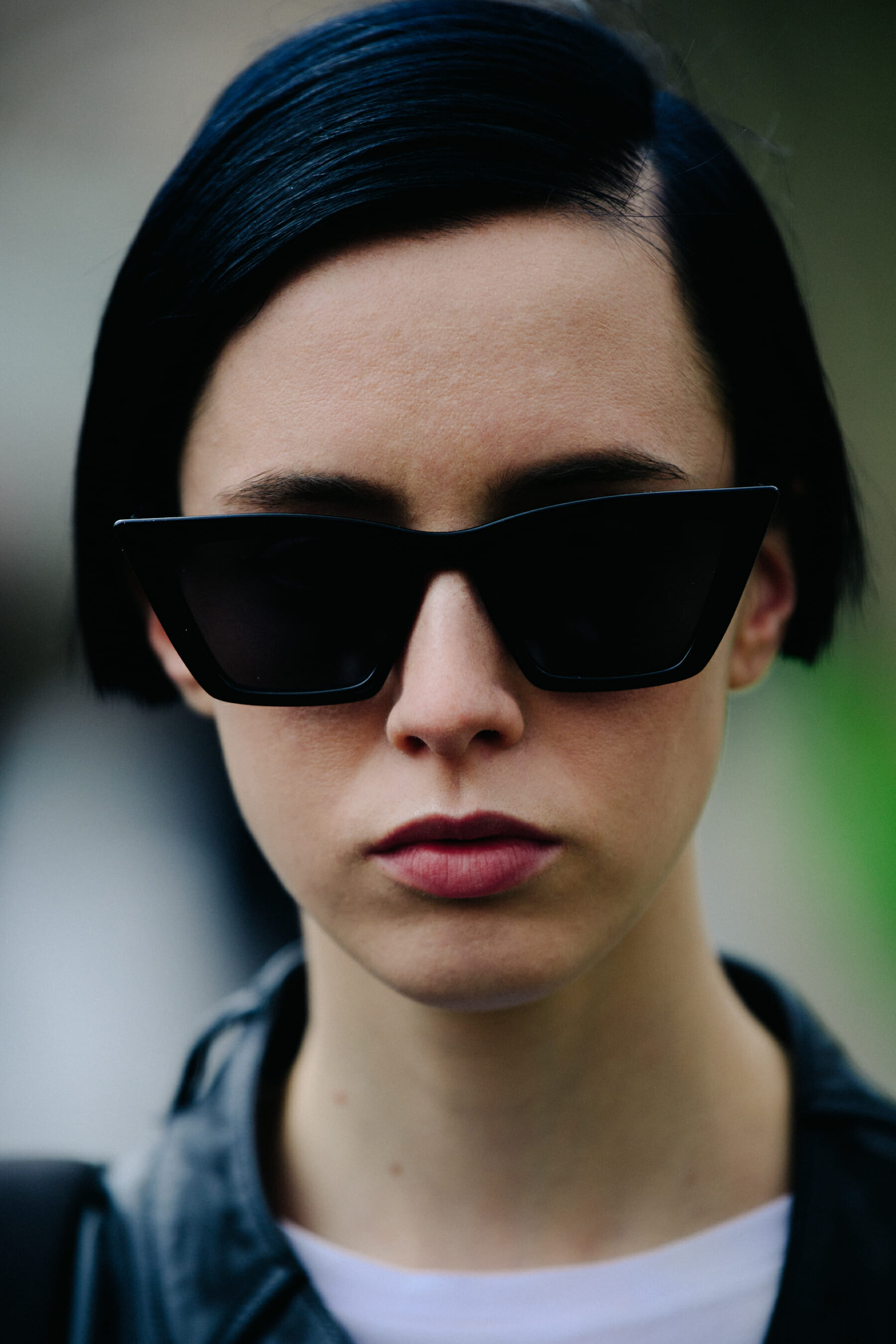 Portrait of model wearing dark sunglasses