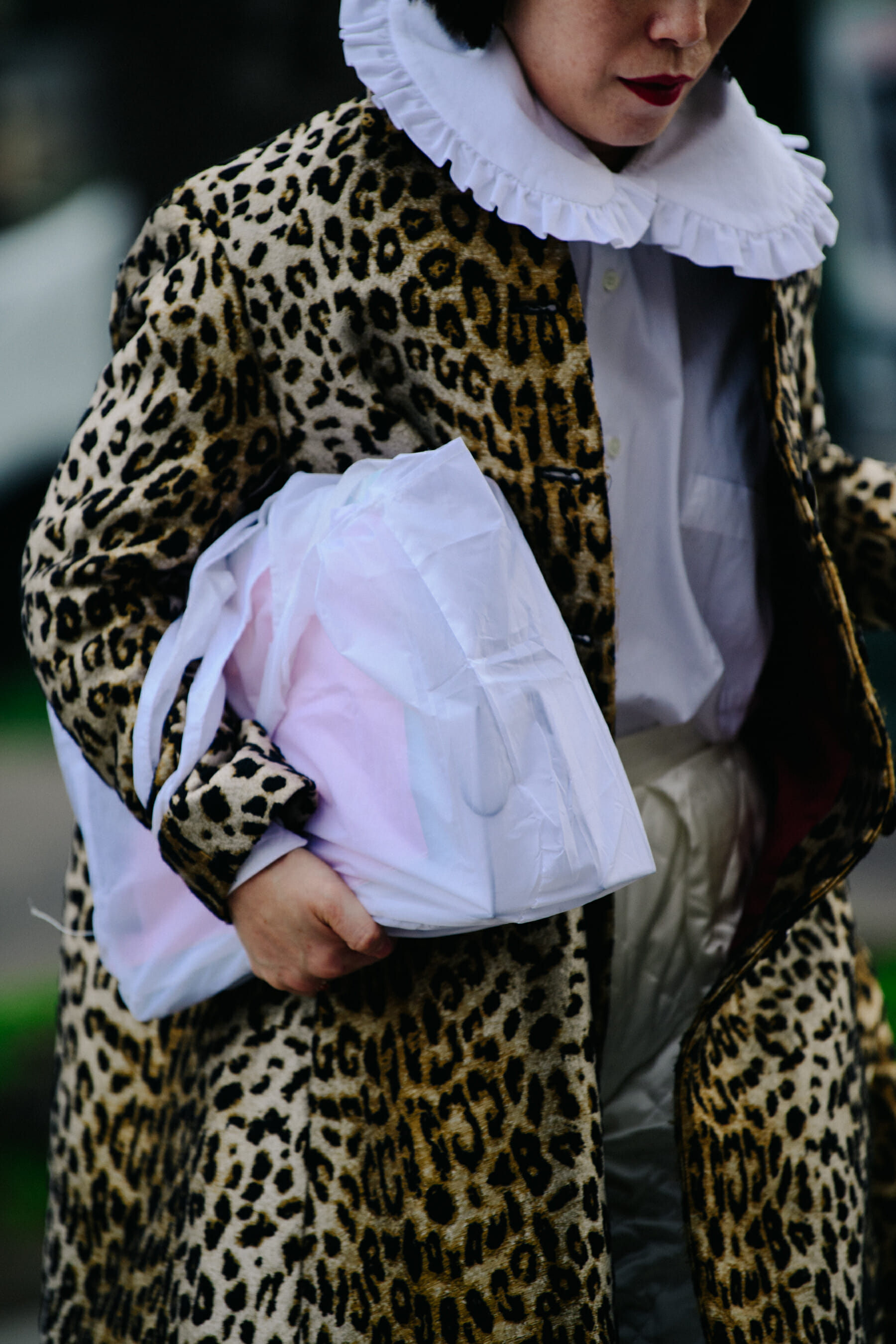Woman wearing animal print coat