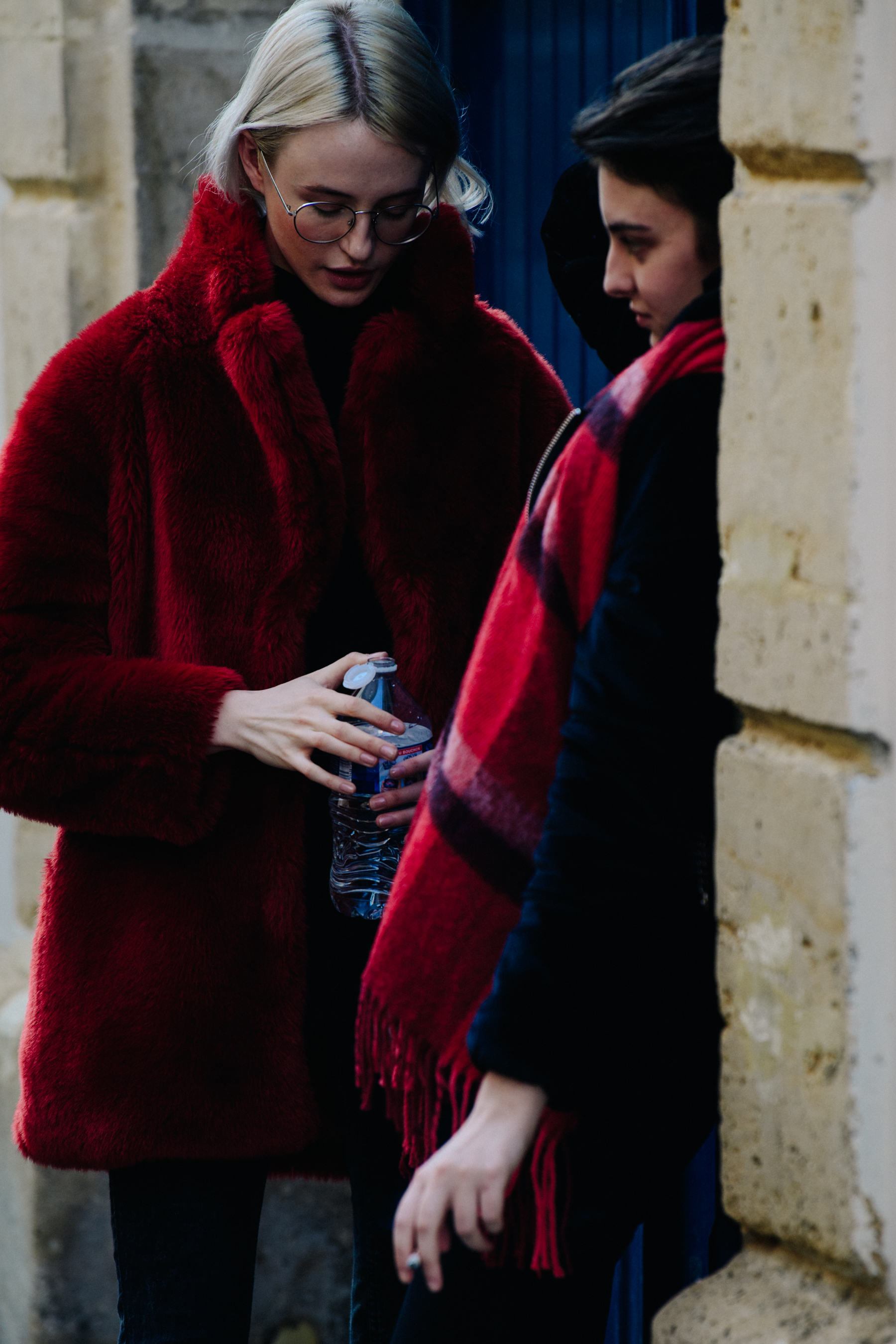 Two models wearing red