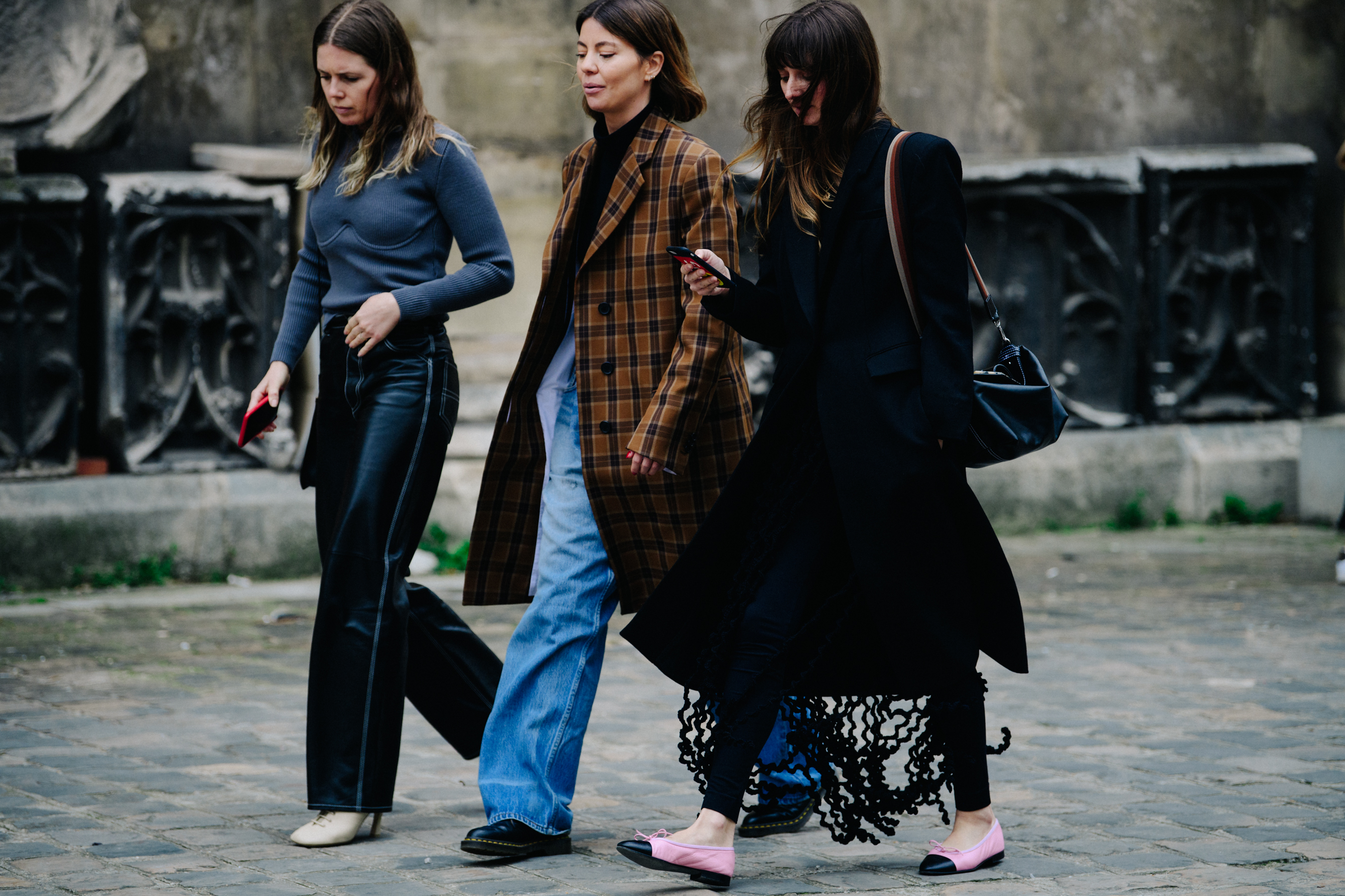 Three women dressed fashionably