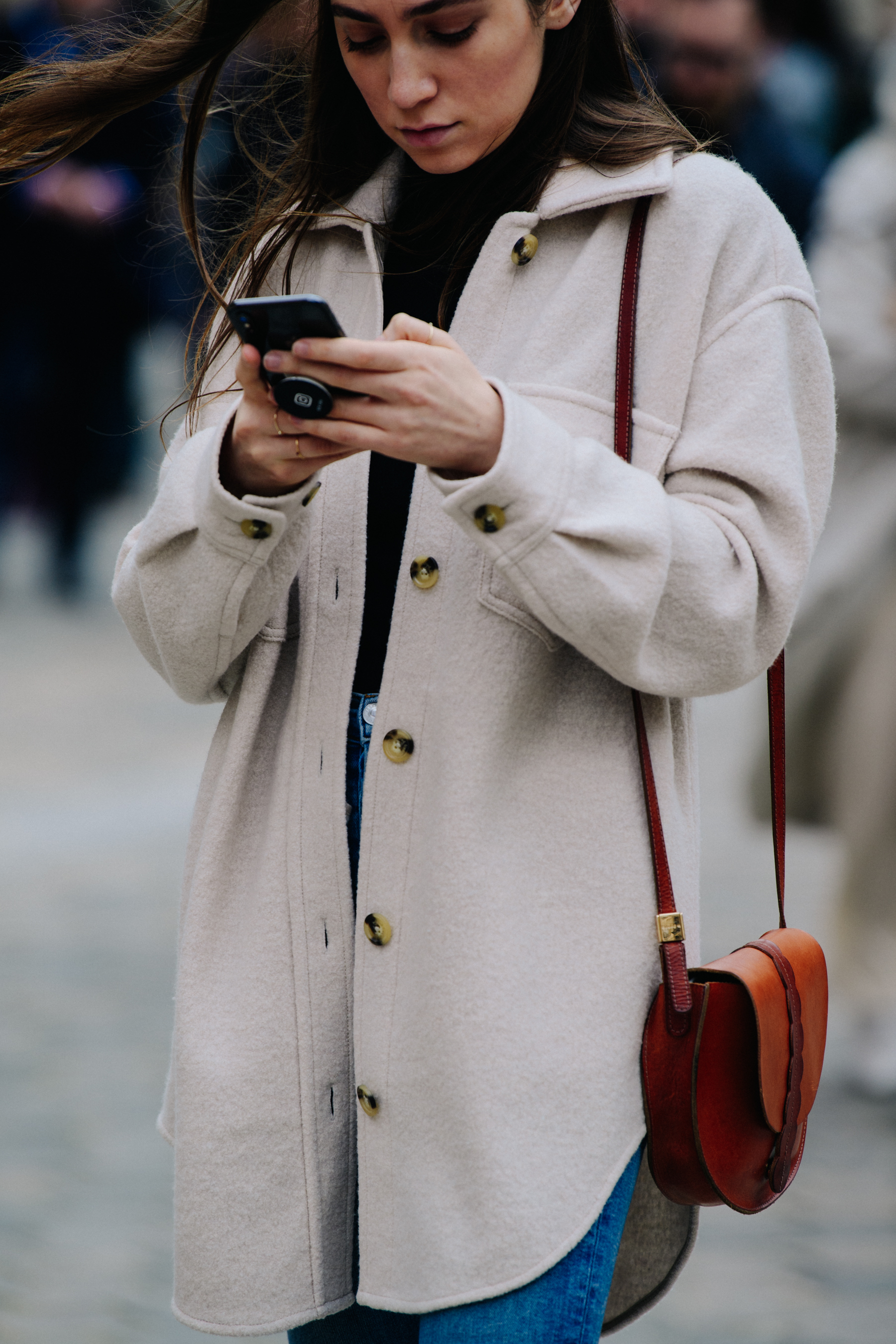 Woman wearing light wool shirt