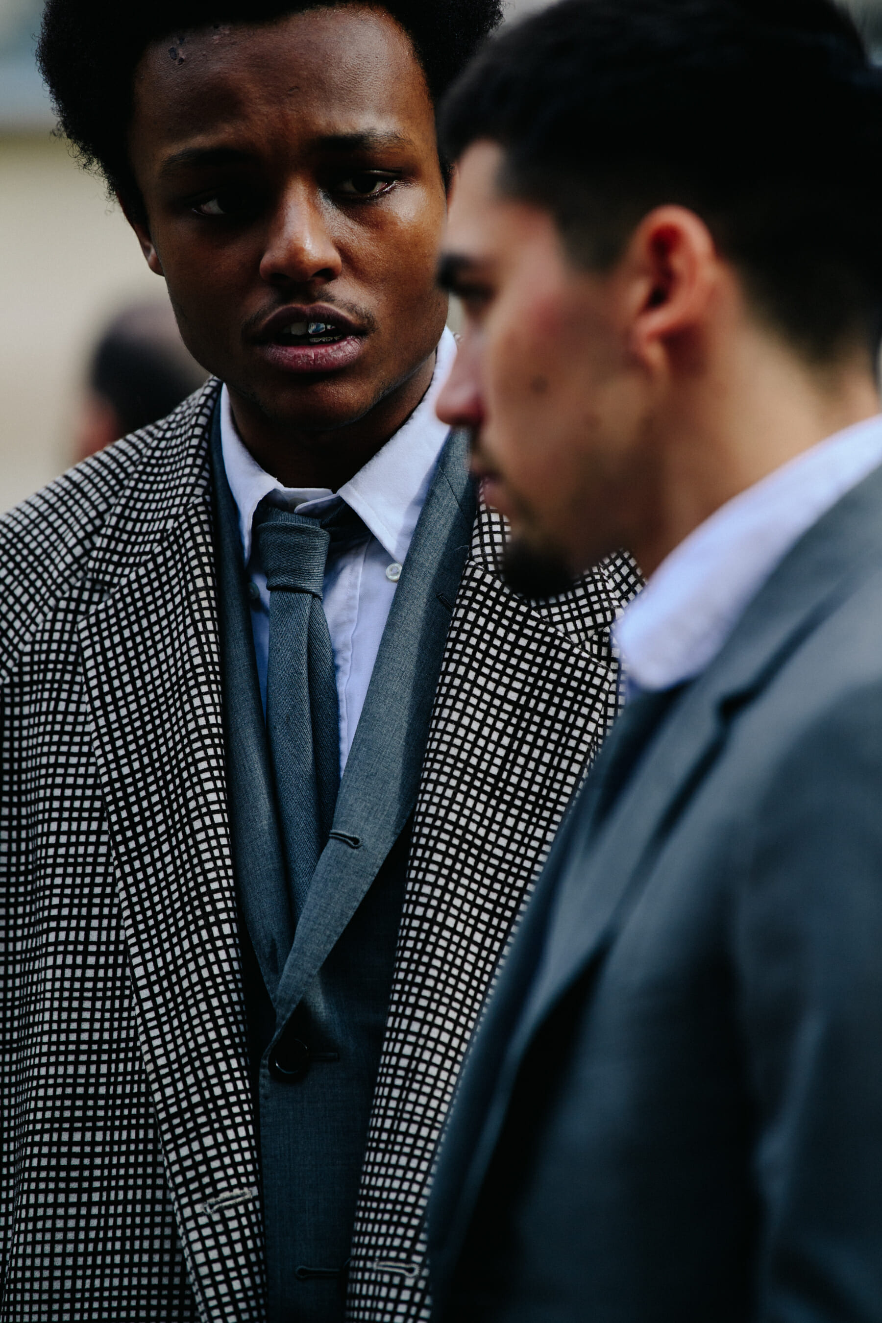 Man wearing grey suit