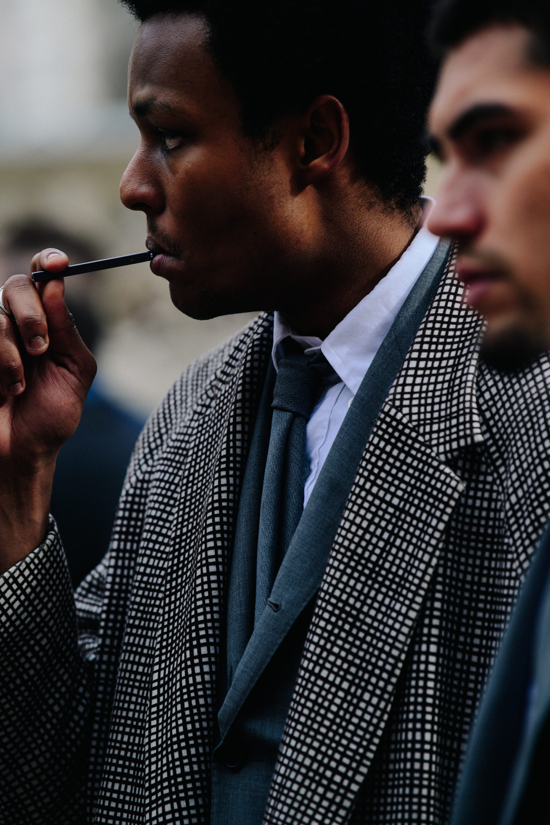 Man wearing grey suit