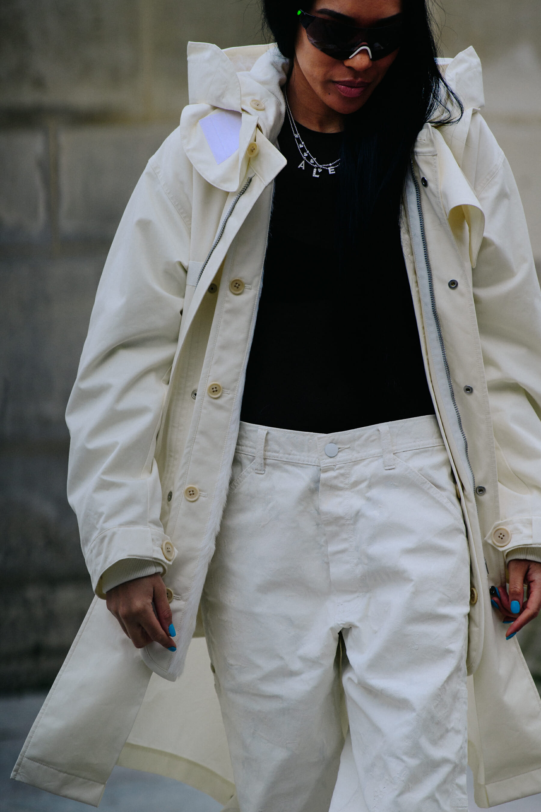 Woman wearing white coat