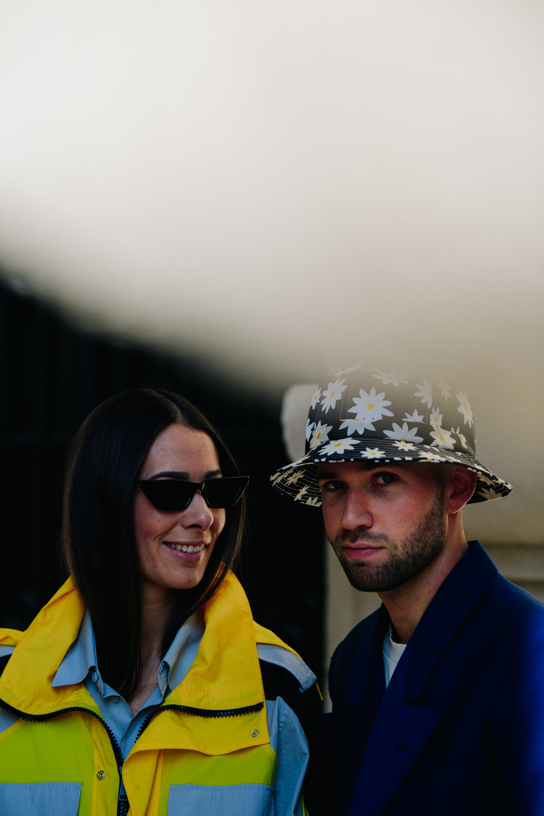 French couple wearing blue and yellow