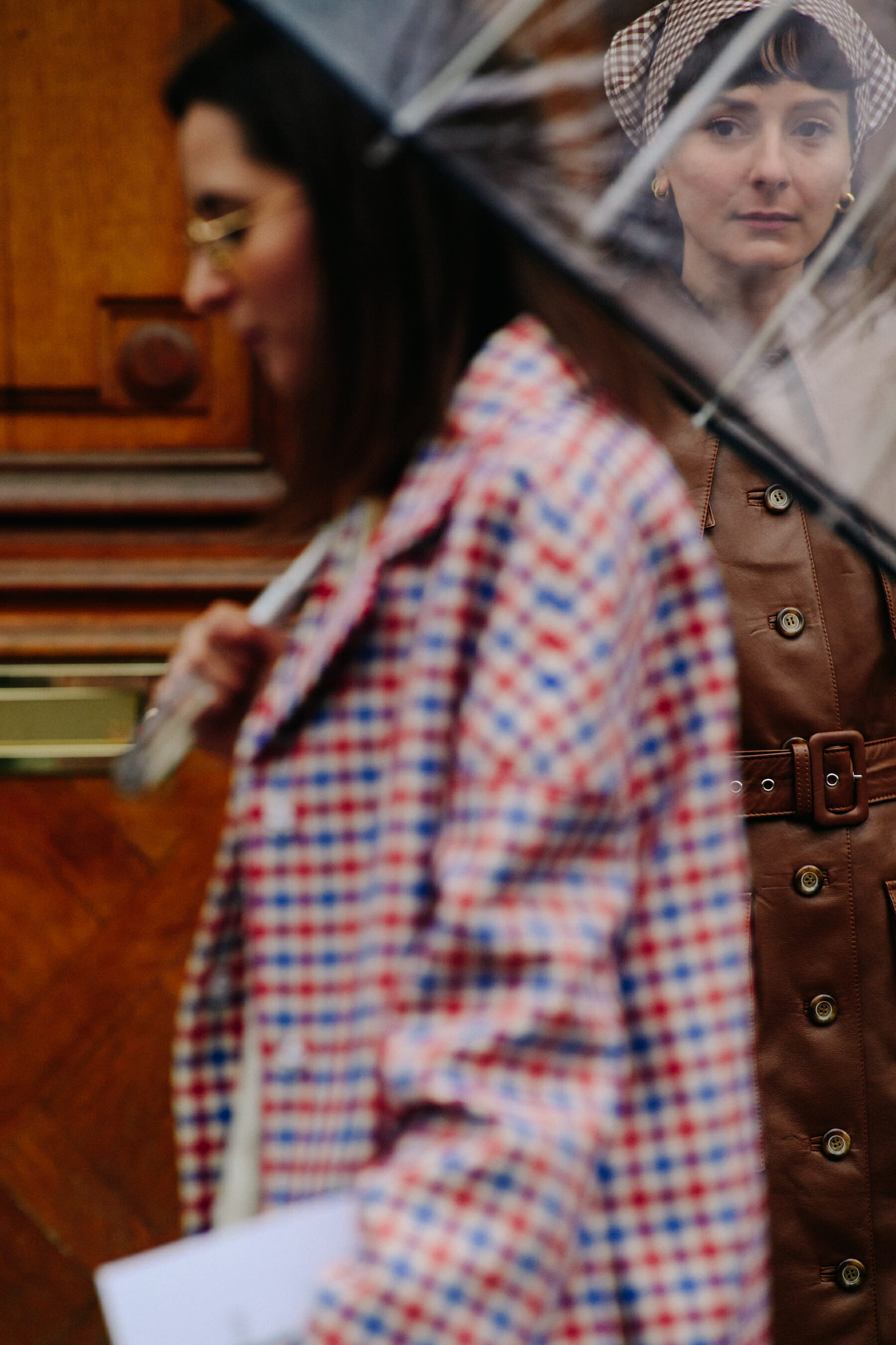 Woman wearing brown leather coat