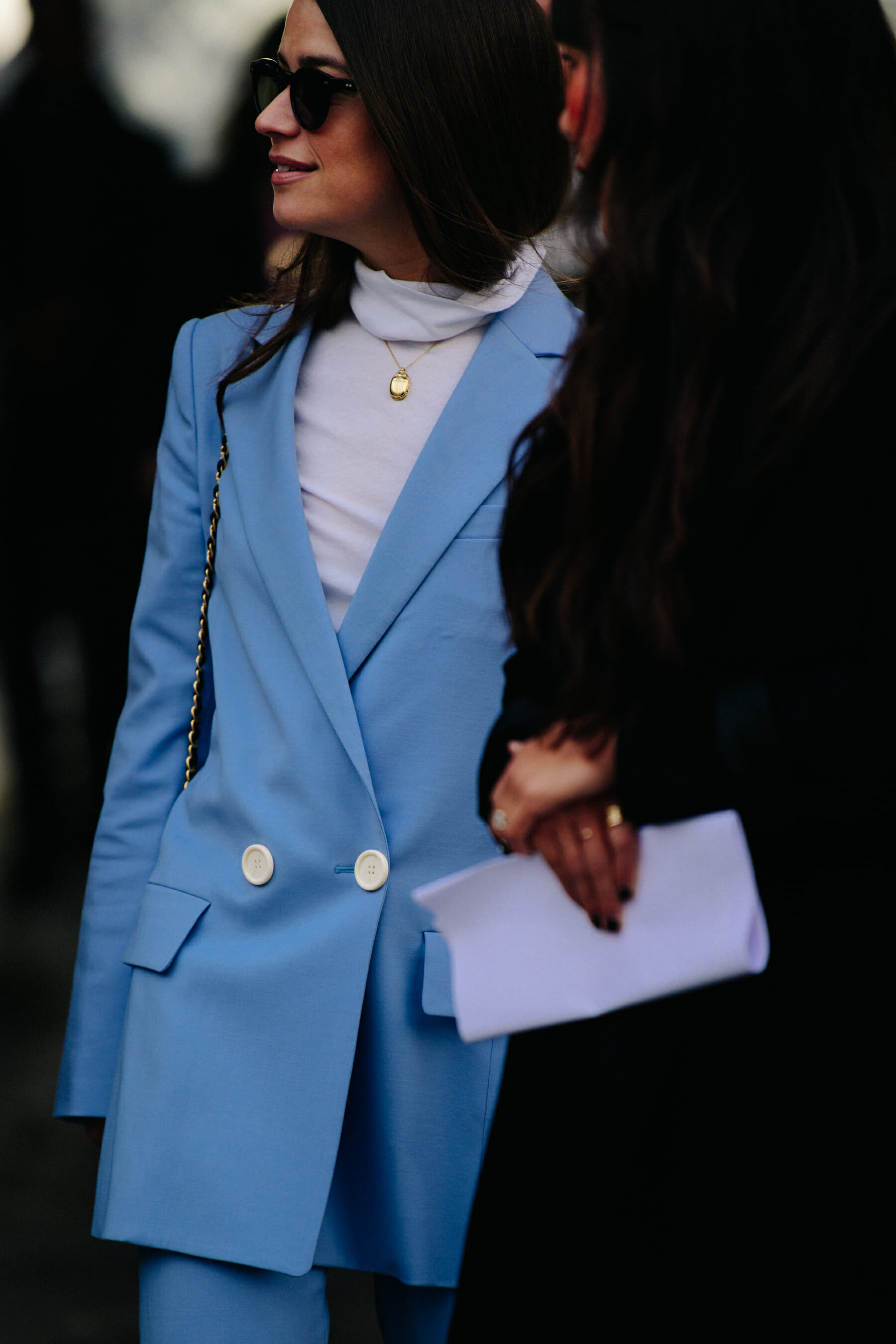 Woman wearing blue suit