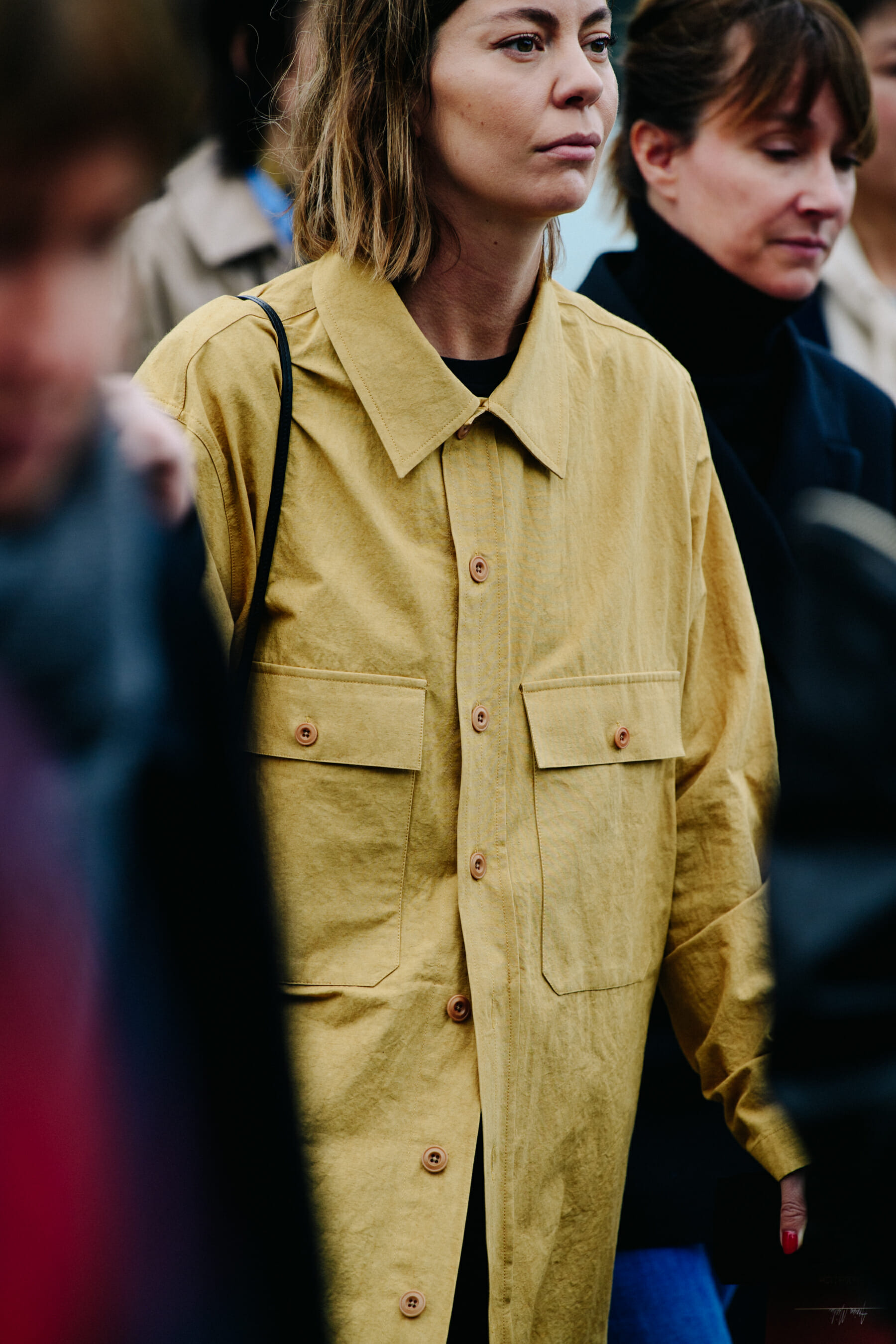 Woman wearing yellow shirt