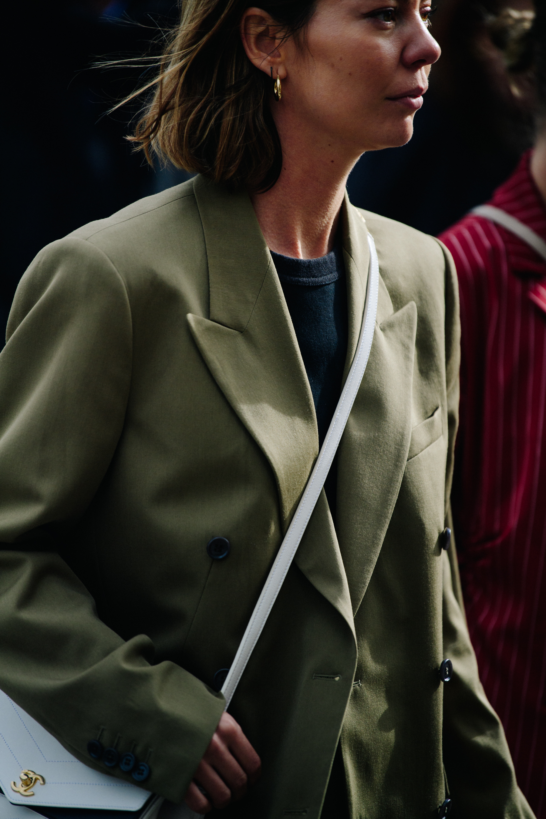 Woman wearing green jacket