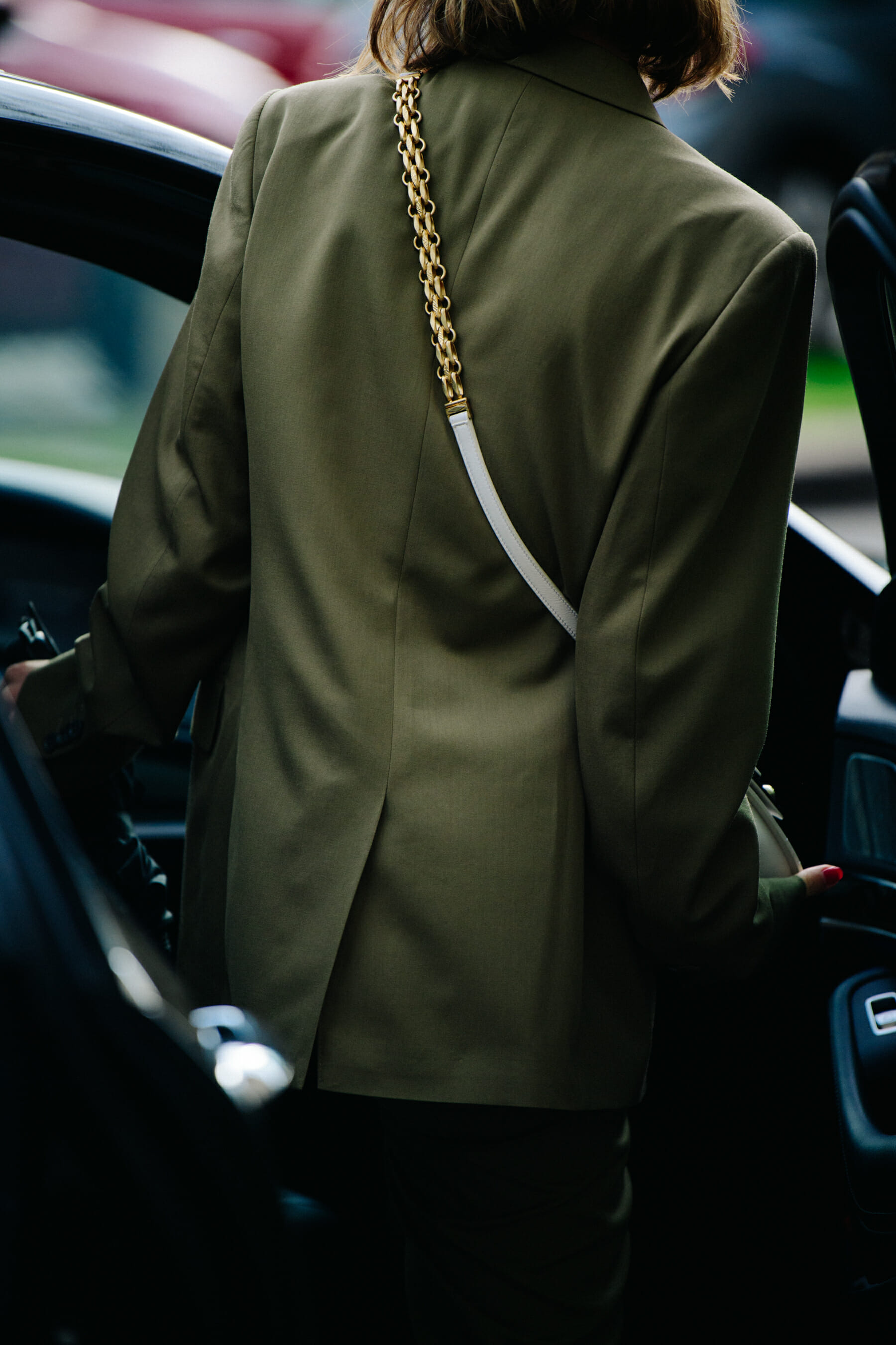 Woman wearing green jacket